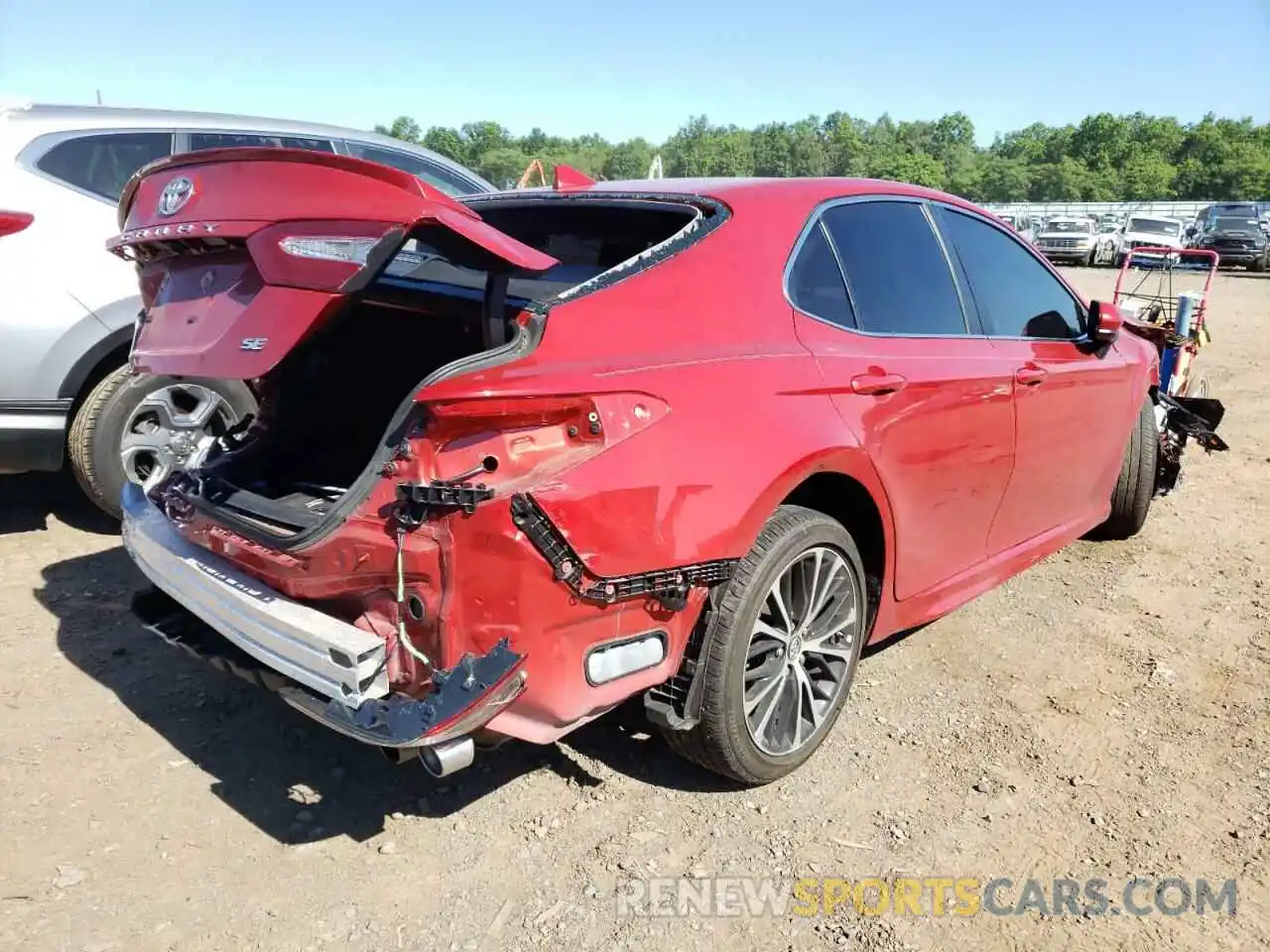 4 Photograph of a damaged car 4T1B11HK4KU270762 TOYOTA CAMRY 2019