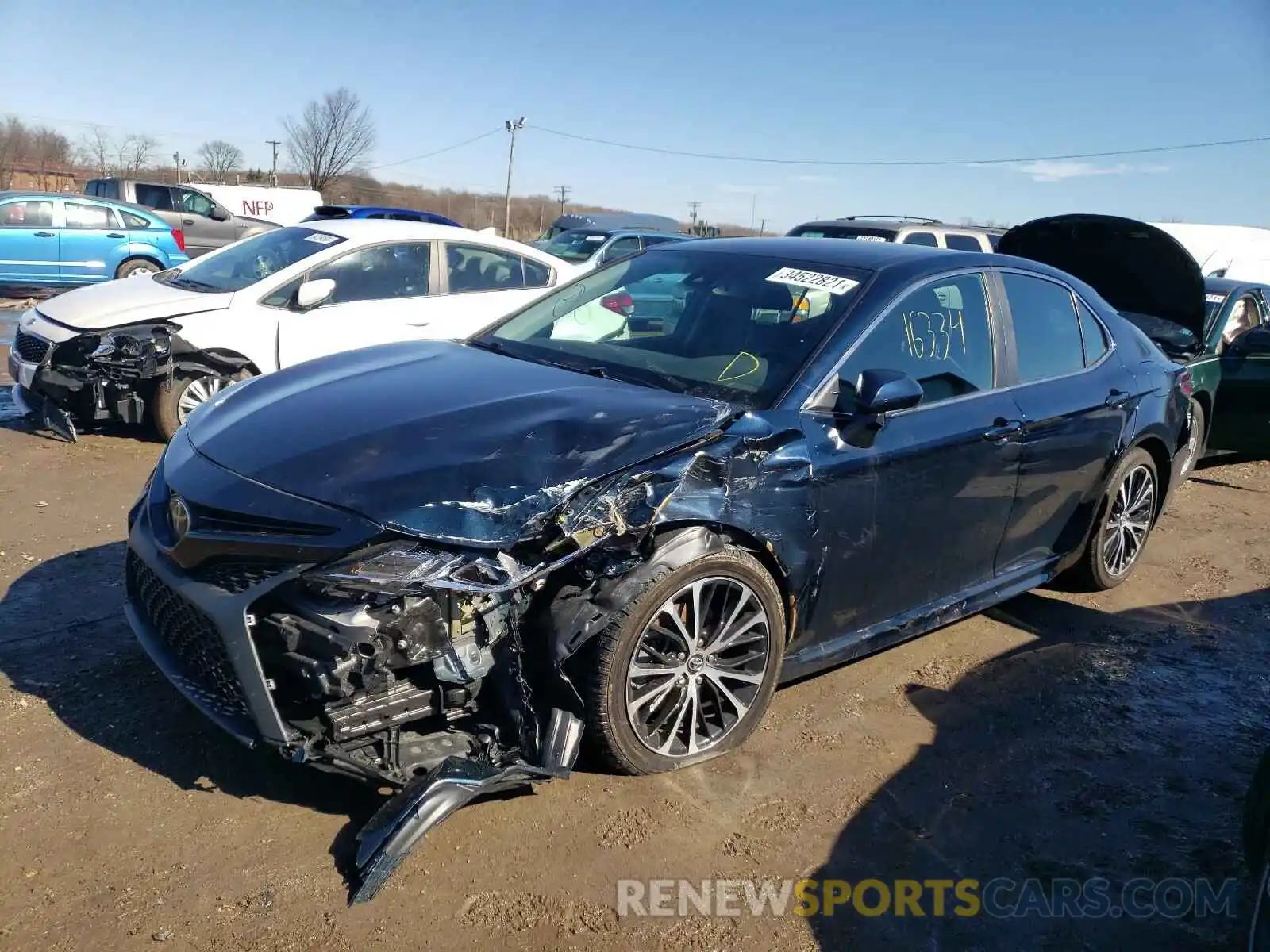 2 Photograph of a damaged car 4T1B11HK4KU283981 TOYOTA CAMRY 2019