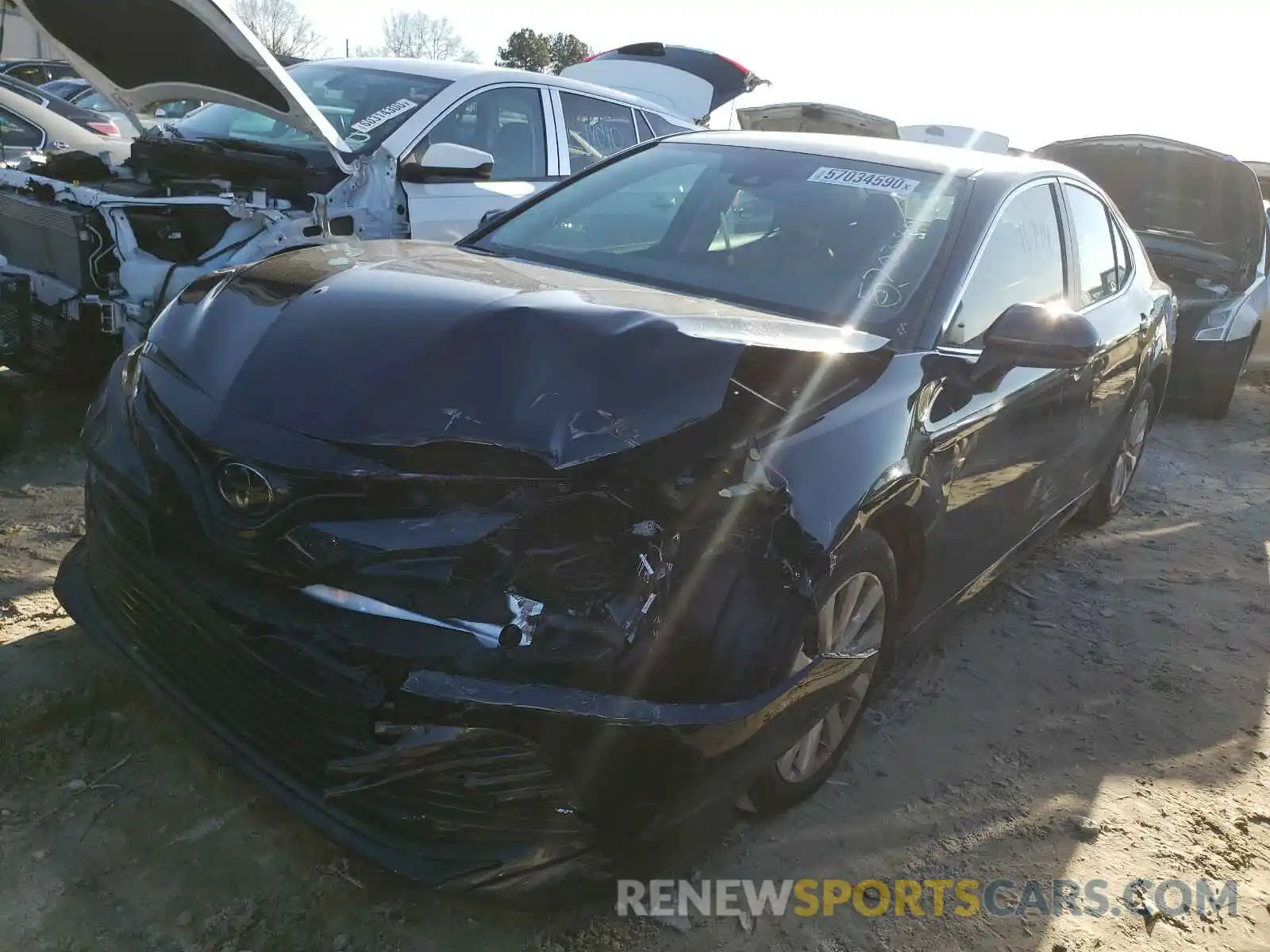 2 Photograph of a damaged car 4T1B11HK4KU290087 TOYOTA CAMRY 2019