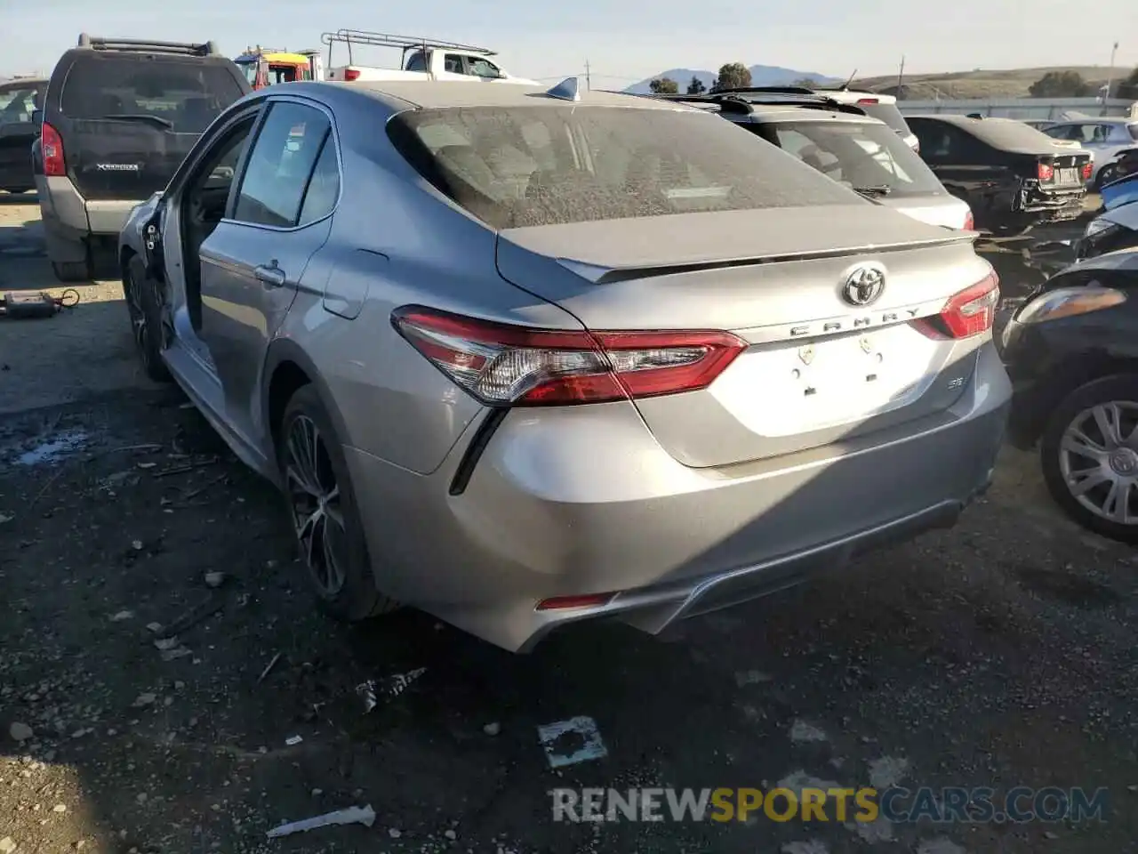 2 Photograph of a damaged car 4T1B11HK4KU684656 TOYOTA CAMRY 2019