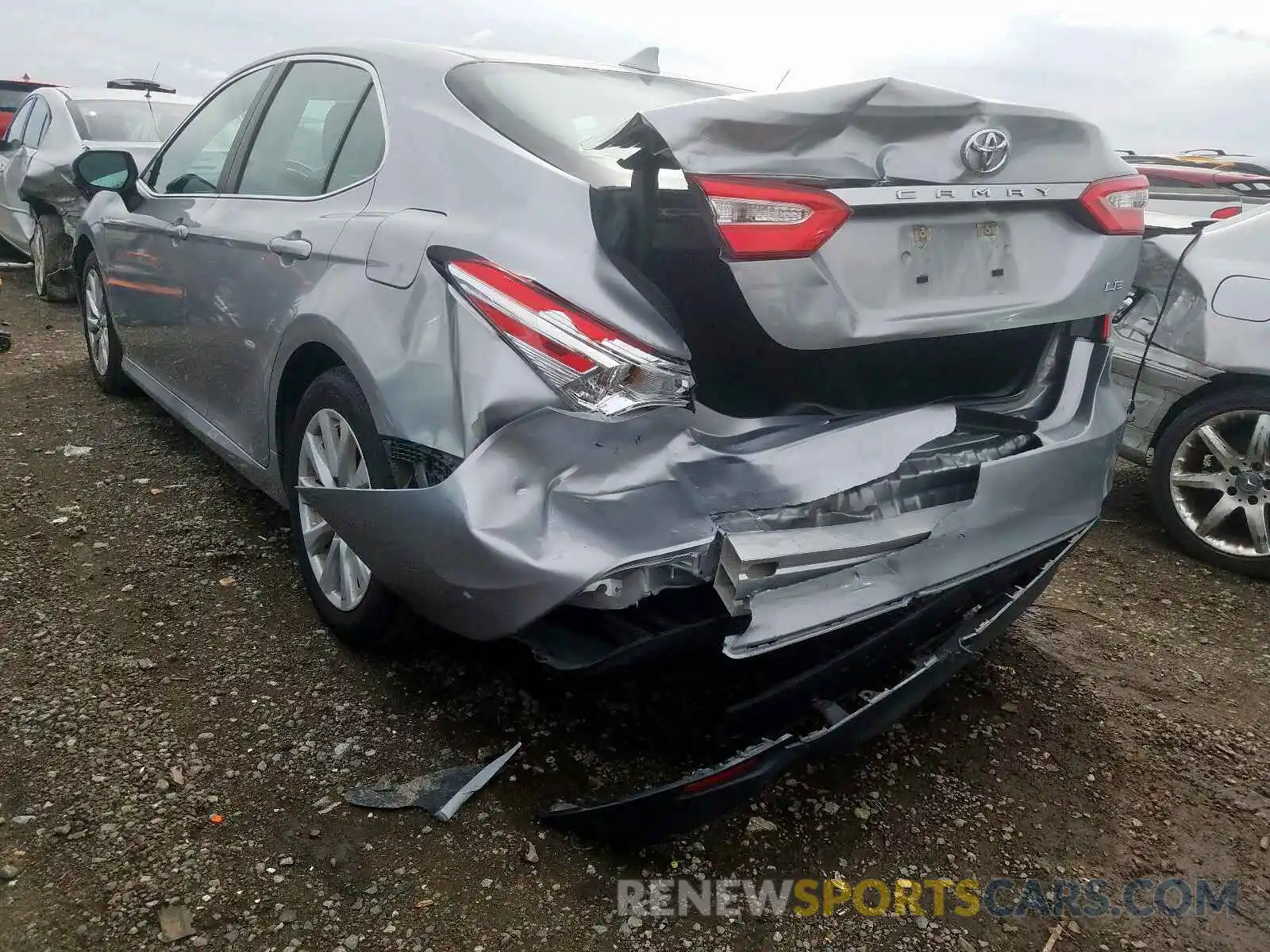 3 Photograph of a damaged car 4T1B11HK4KU687203 TOYOTA CAMRY 2019