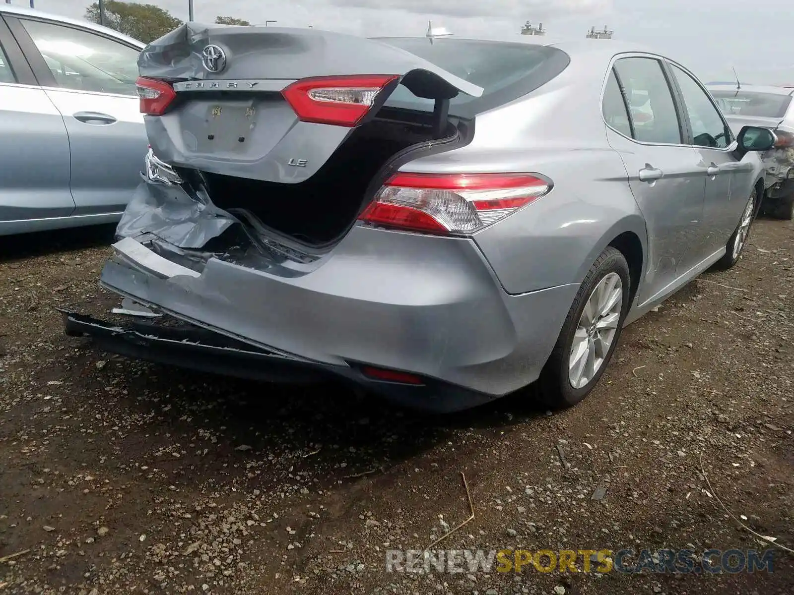 4 Photograph of a damaged car 4T1B11HK4KU687203 TOYOTA CAMRY 2019