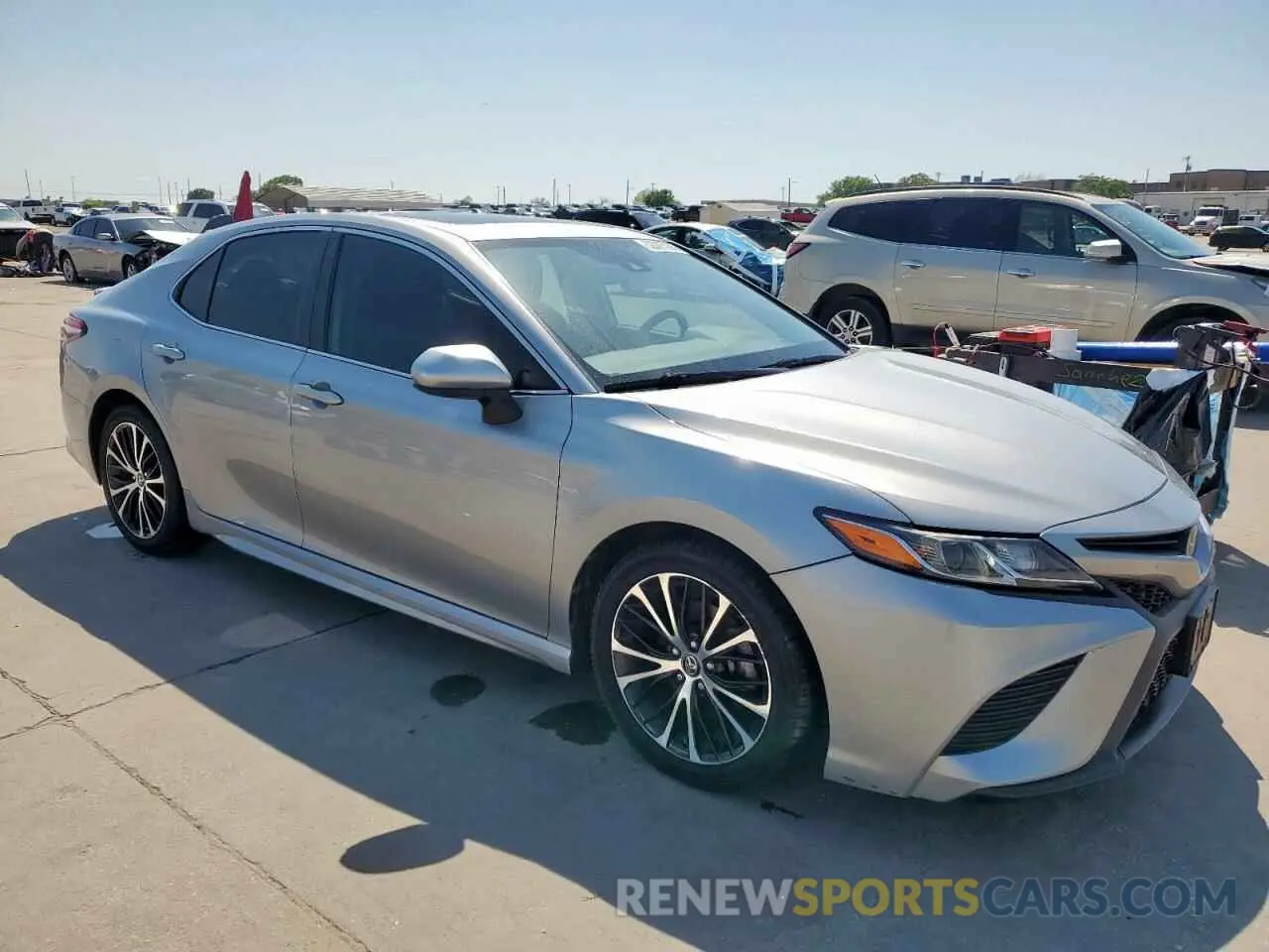 4 Photograph of a damaged car 4T1B11HK4KU690196 TOYOTA CAMRY 2019