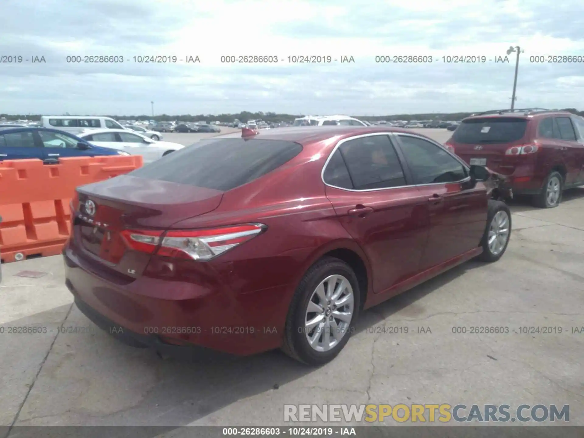 4 Photograph of a damaged car 4T1B11HK4KU690313 TOYOTA CAMRY 2019