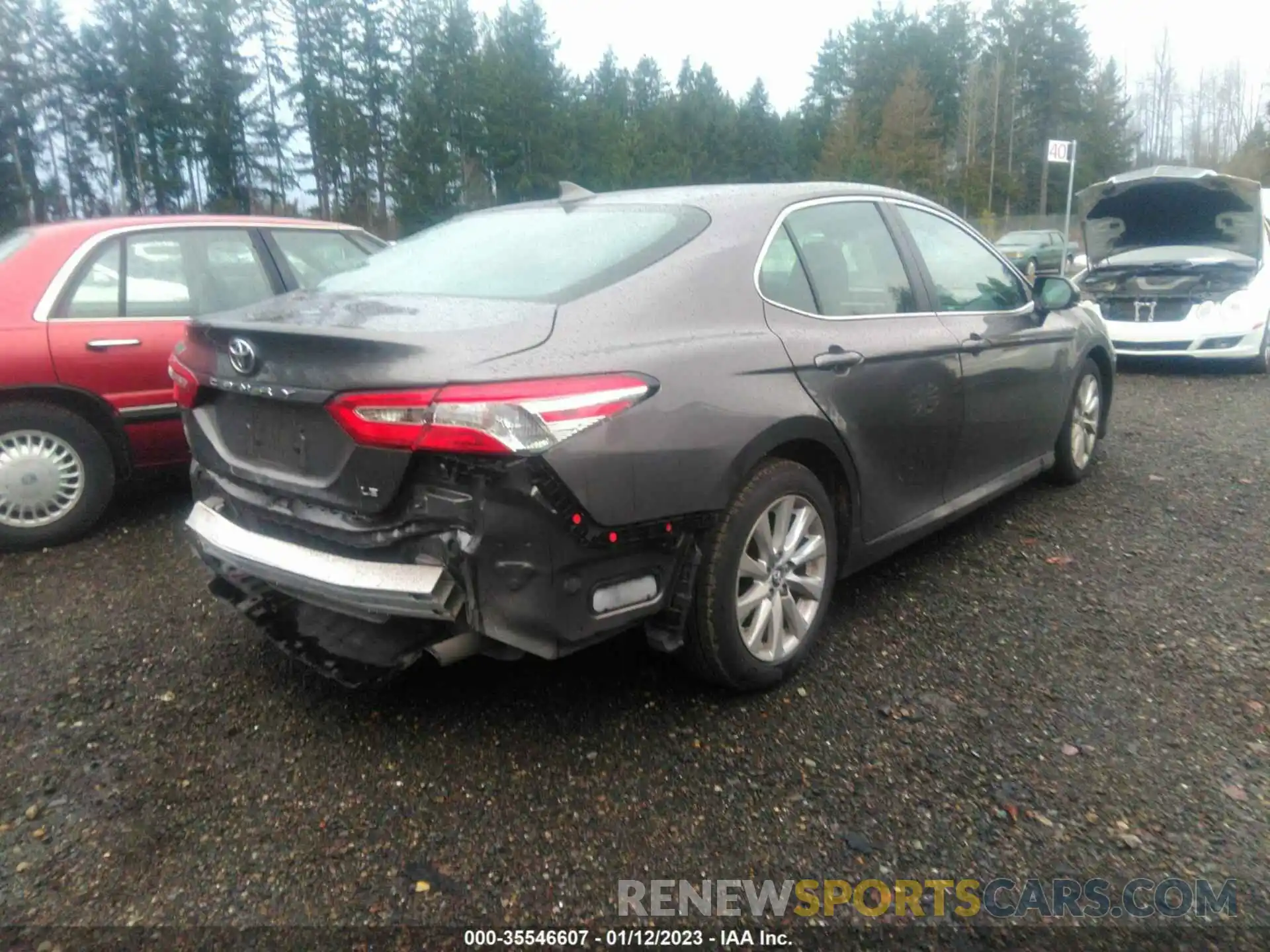 4 Photograph of a damaged car 4T1B11HK4KU690652 TOYOTA CAMRY 2019