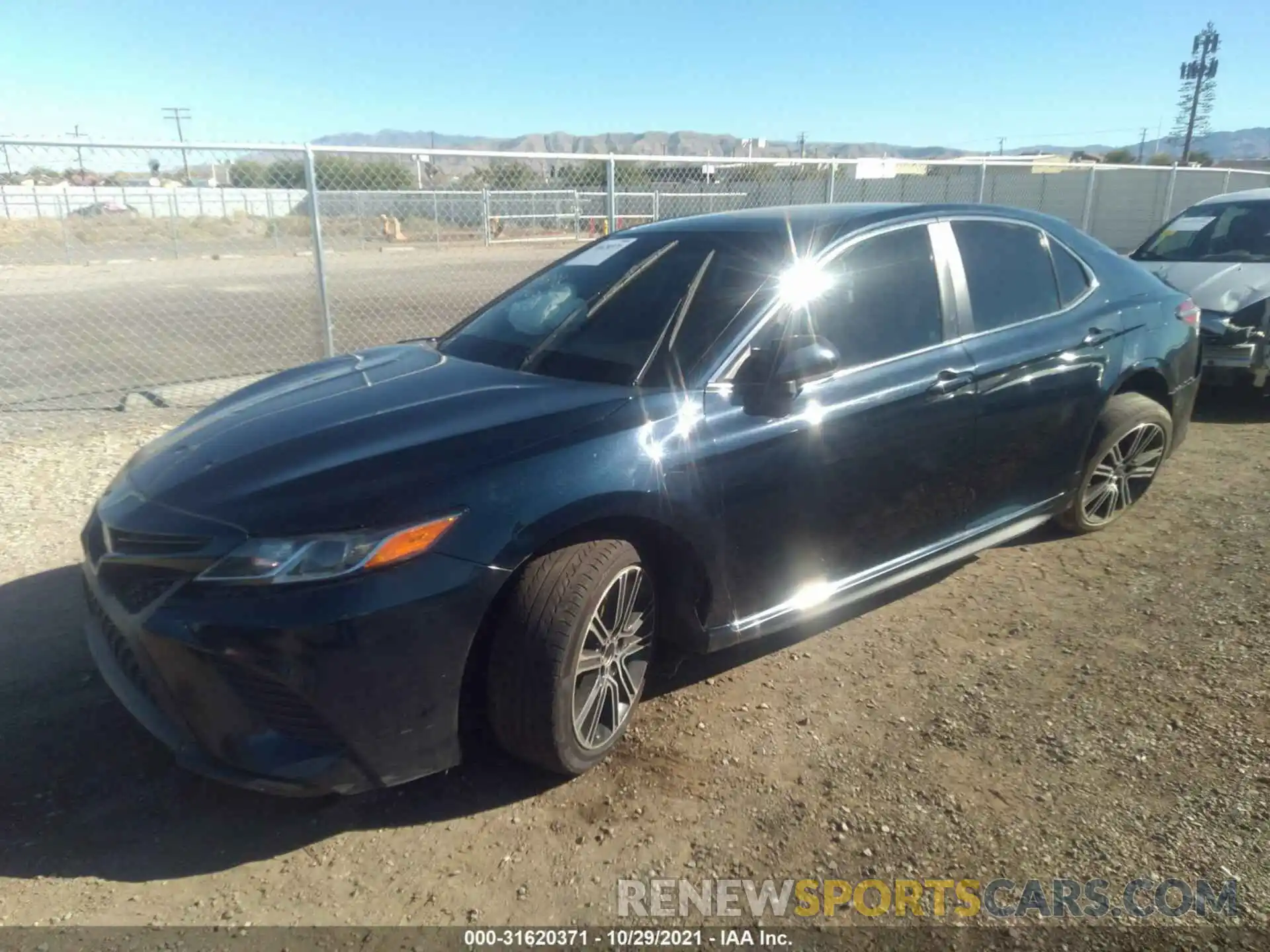 2 Photograph of a damaged car 4T1B11HK4KU693843 TOYOTA CAMRY 2019