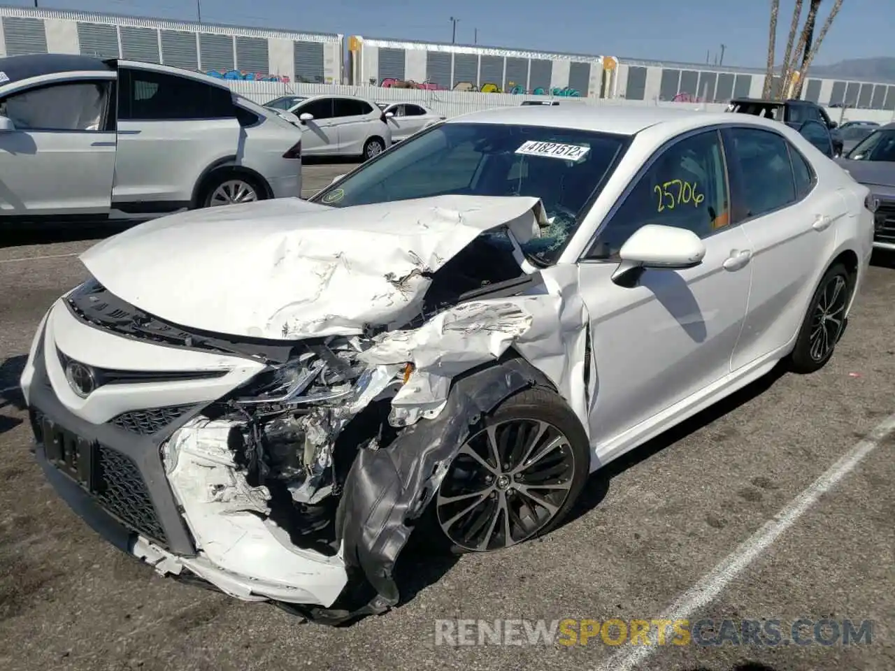 2 Photograph of a damaged car 4T1B11HK4KU694605 TOYOTA CAMRY 2019