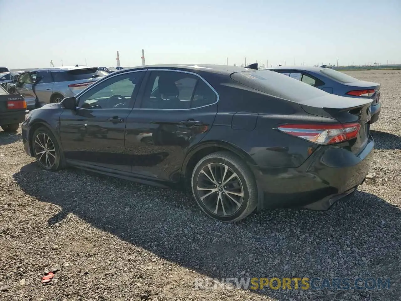 2 Photograph of a damaged car 4T1B11HK4KU695575 TOYOTA CAMRY 2019