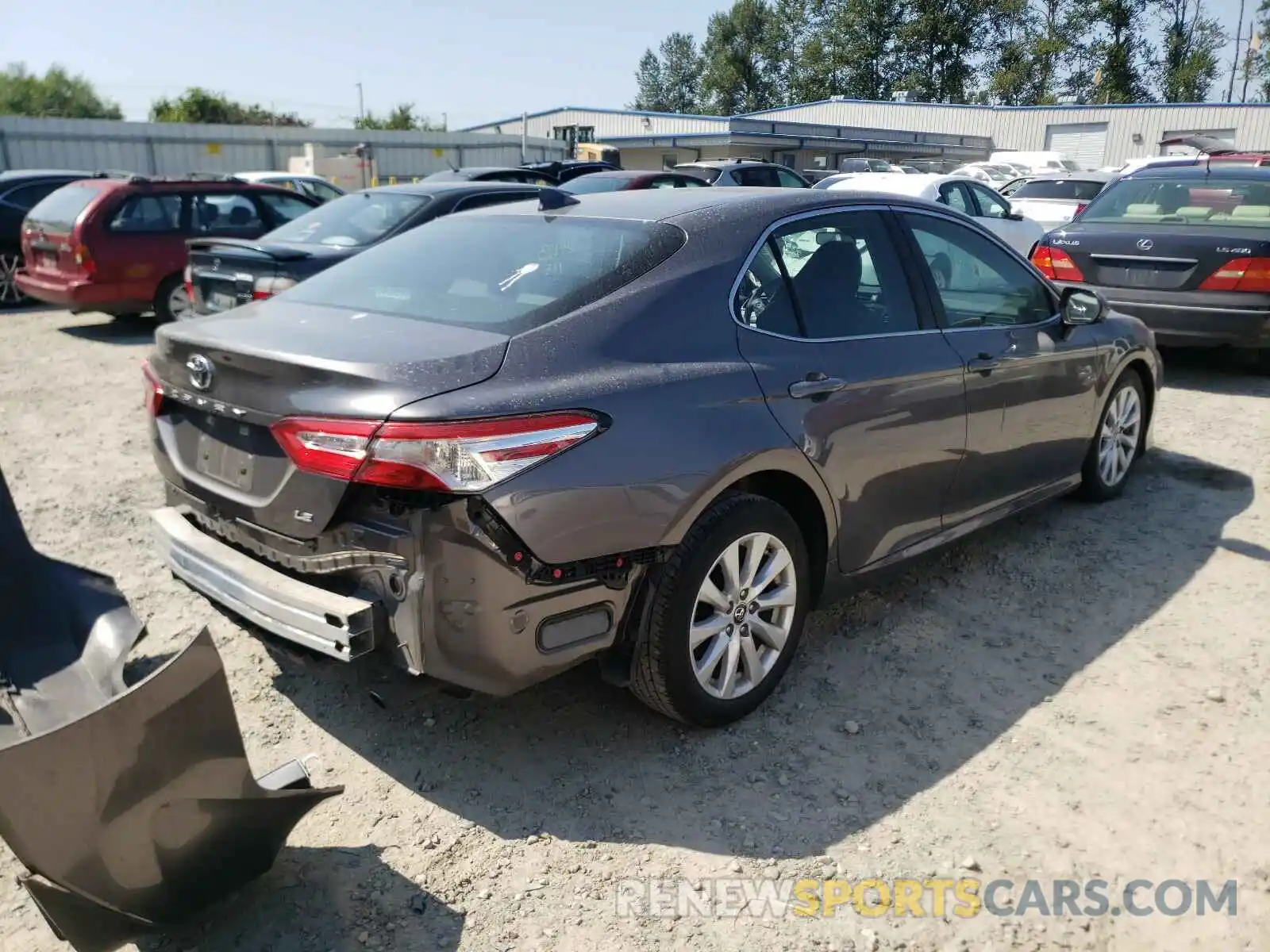 4 Photograph of a damaged car 4T1B11HK4KU701682 TOYOTA CAMRY 2019