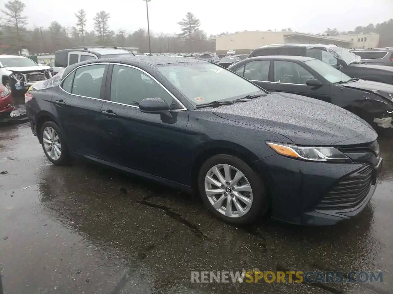 4 Photograph of a damaged car 4T1B11HK4KU703478 TOYOTA CAMRY 2019