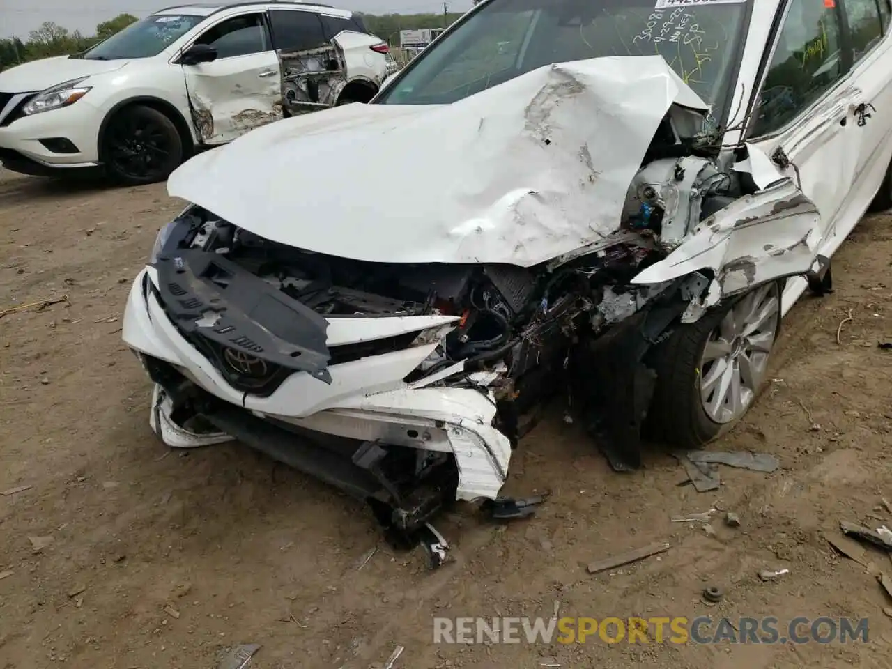 9 Photograph of a damaged car 4T1B11HK4KU705926 TOYOTA CAMRY 2019