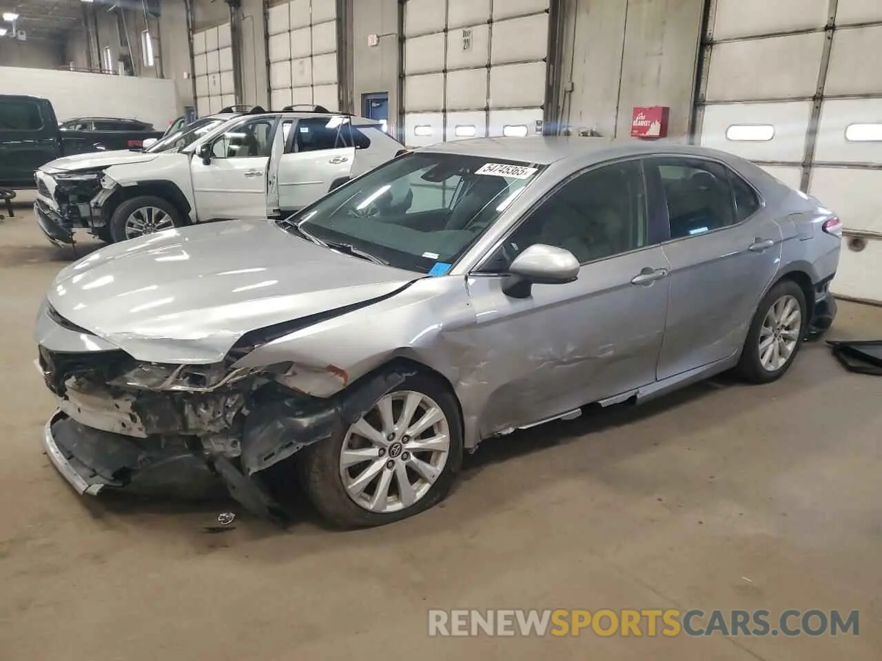 1 Photograph of a damaged car 4T1B11HK4KU706669 TOYOTA CAMRY 2019