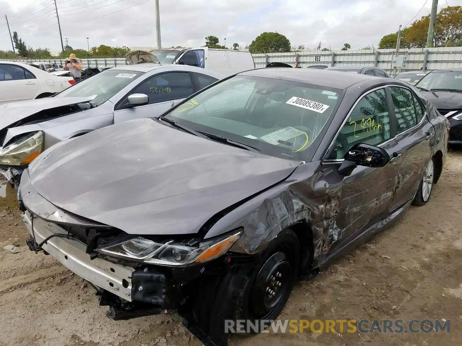 2 Photograph of a damaged car 4T1B11HK4KU708809 TOYOTA CAMRY 2019