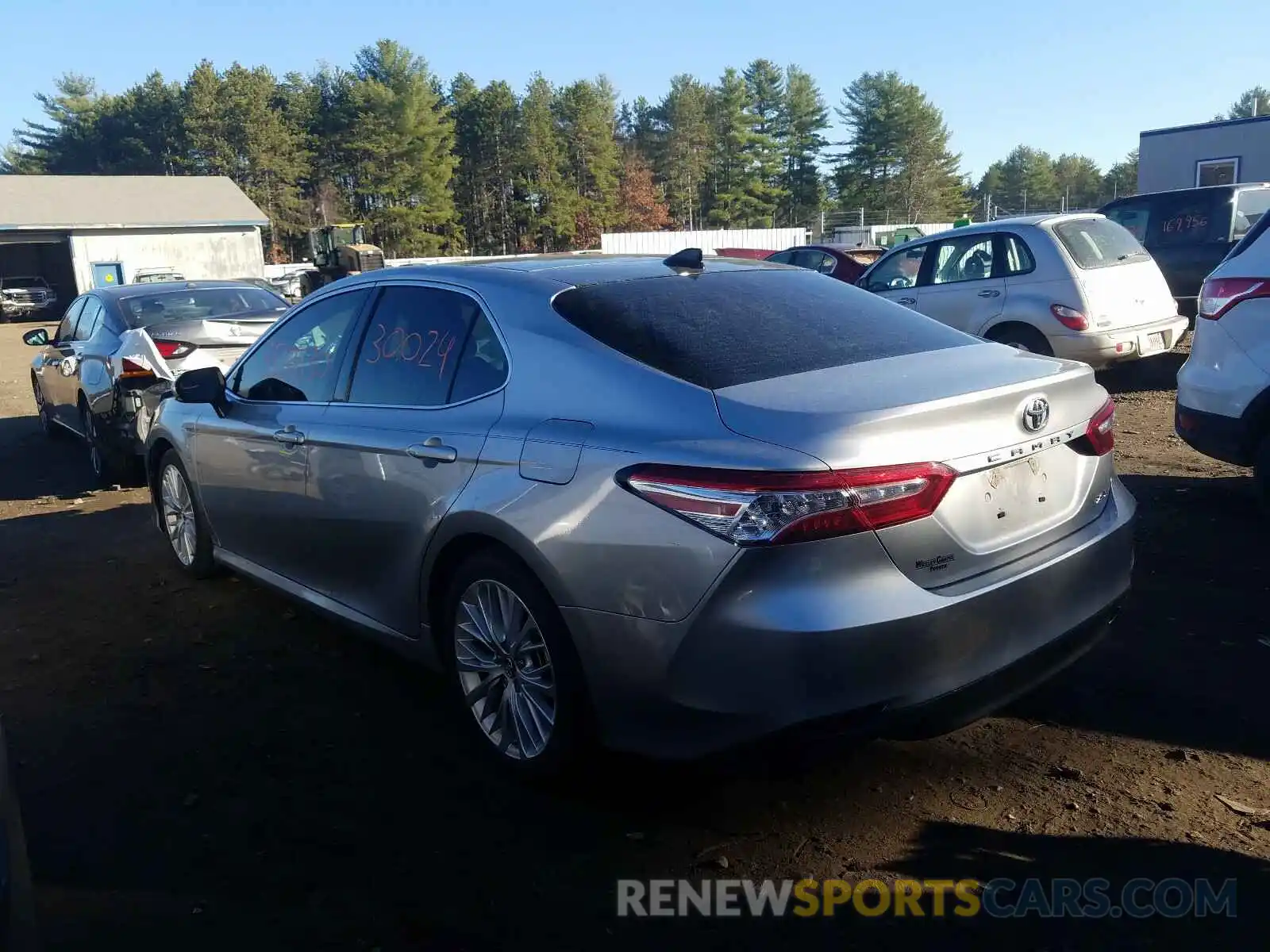 3 Photograph of a damaged car 4T1B11HK4KU710933 TOYOTA CAMRY 2019