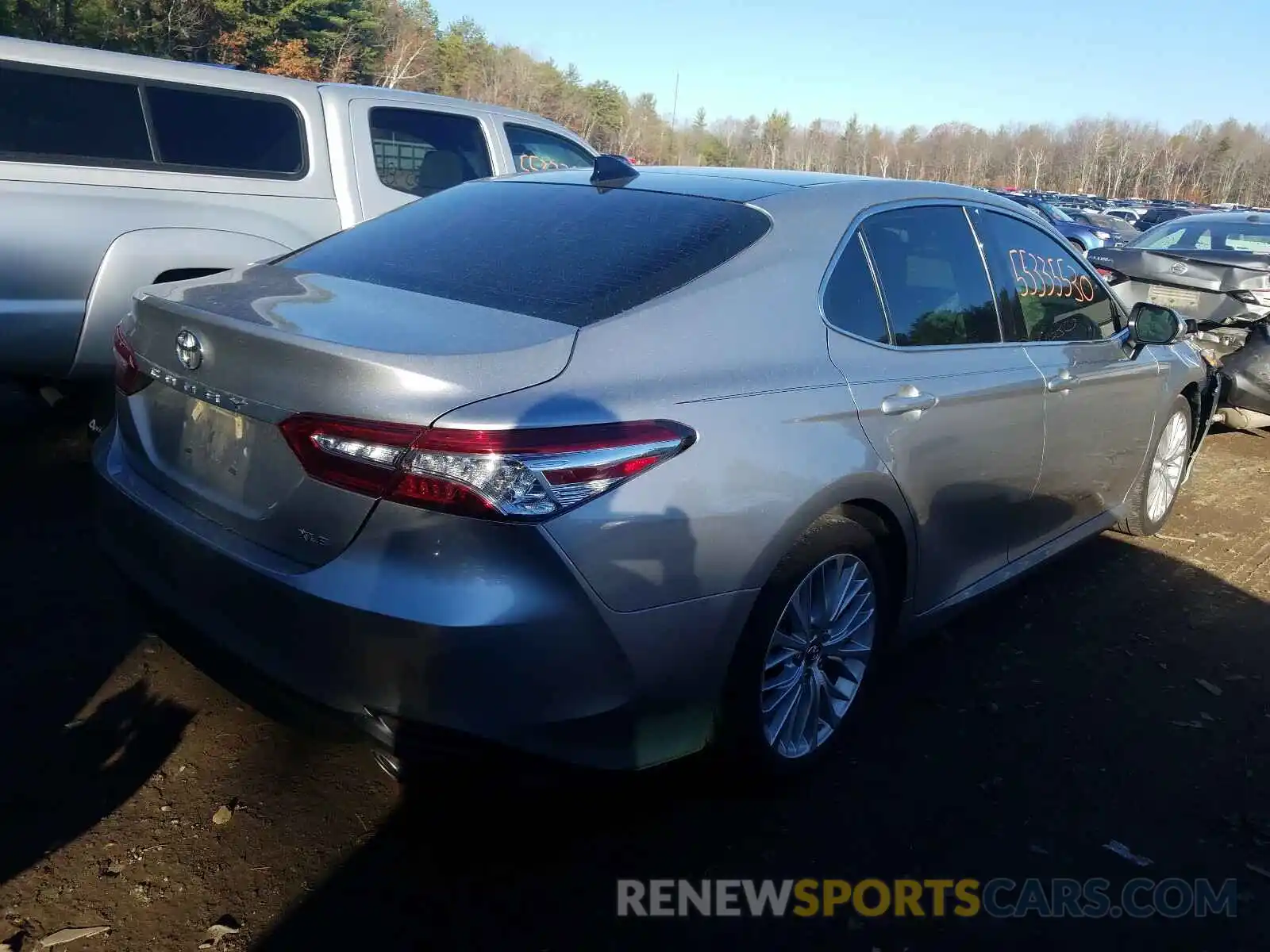 4 Photograph of a damaged car 4T1B11HK4KU710933 TOYOTA CAMRY 2019