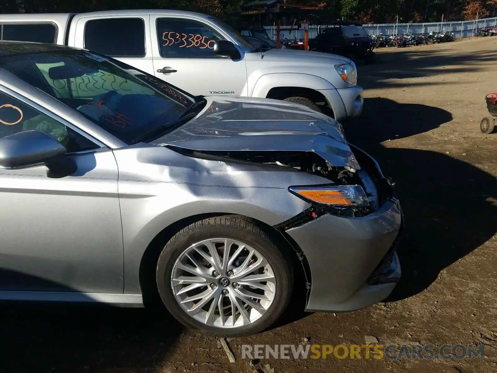 9 Photograph of a damaged car 4T1B11HK4KU710933 TOYOTA CAMRY 2019