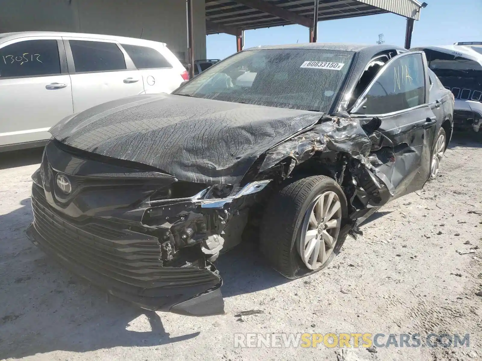 2 Photograph of a damaged car 4T1B11HK4KU712729 TOYOTA CAMRY 2019