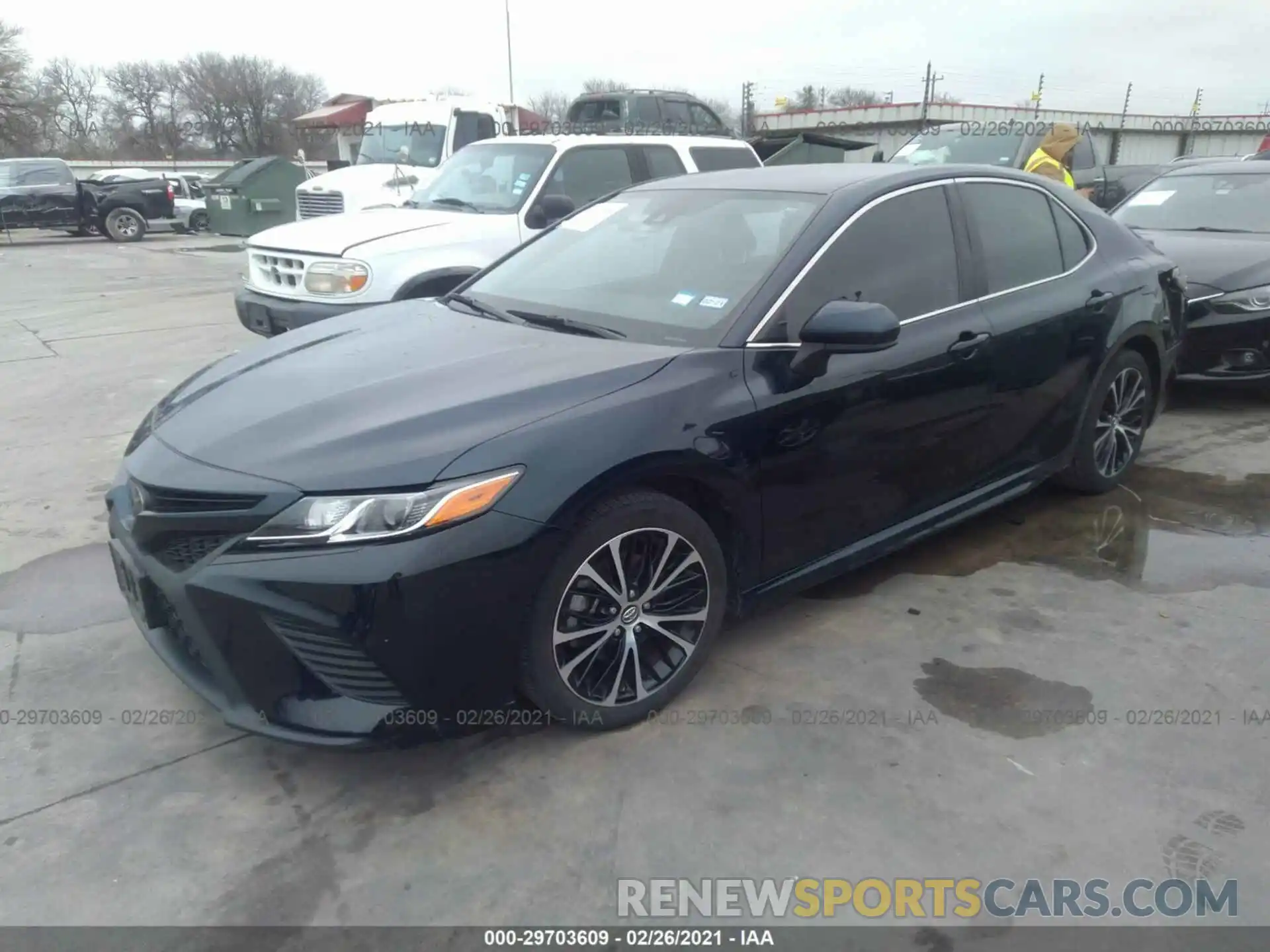 2 Photograph of a damaged car 4T1B11HK4KU717851 TOYOTA CAMRY 2019