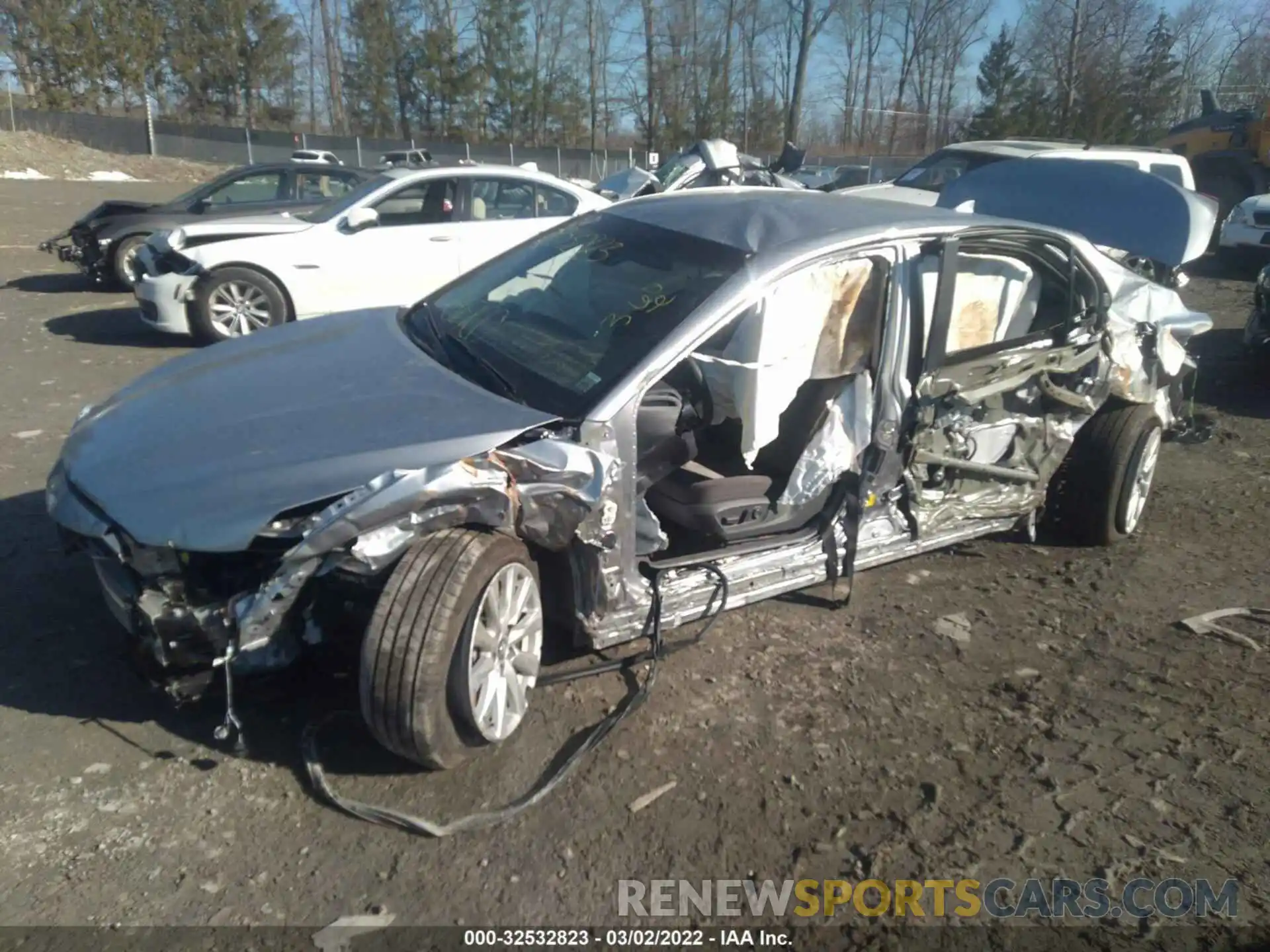 2 Photograph of a damaged car 4T1B11HK4KU717994 TOYOTA CAMRY 2019