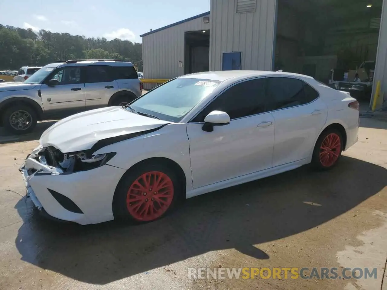1 Photograph of a damaged car 4T1B11HK4KU718014 TOYOTA CAMRY 2019