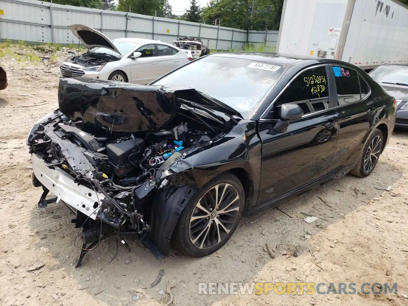 2 Photograph of a damaged car 4T1B11HK4KU718188 TOYOTA CAMRY 2019