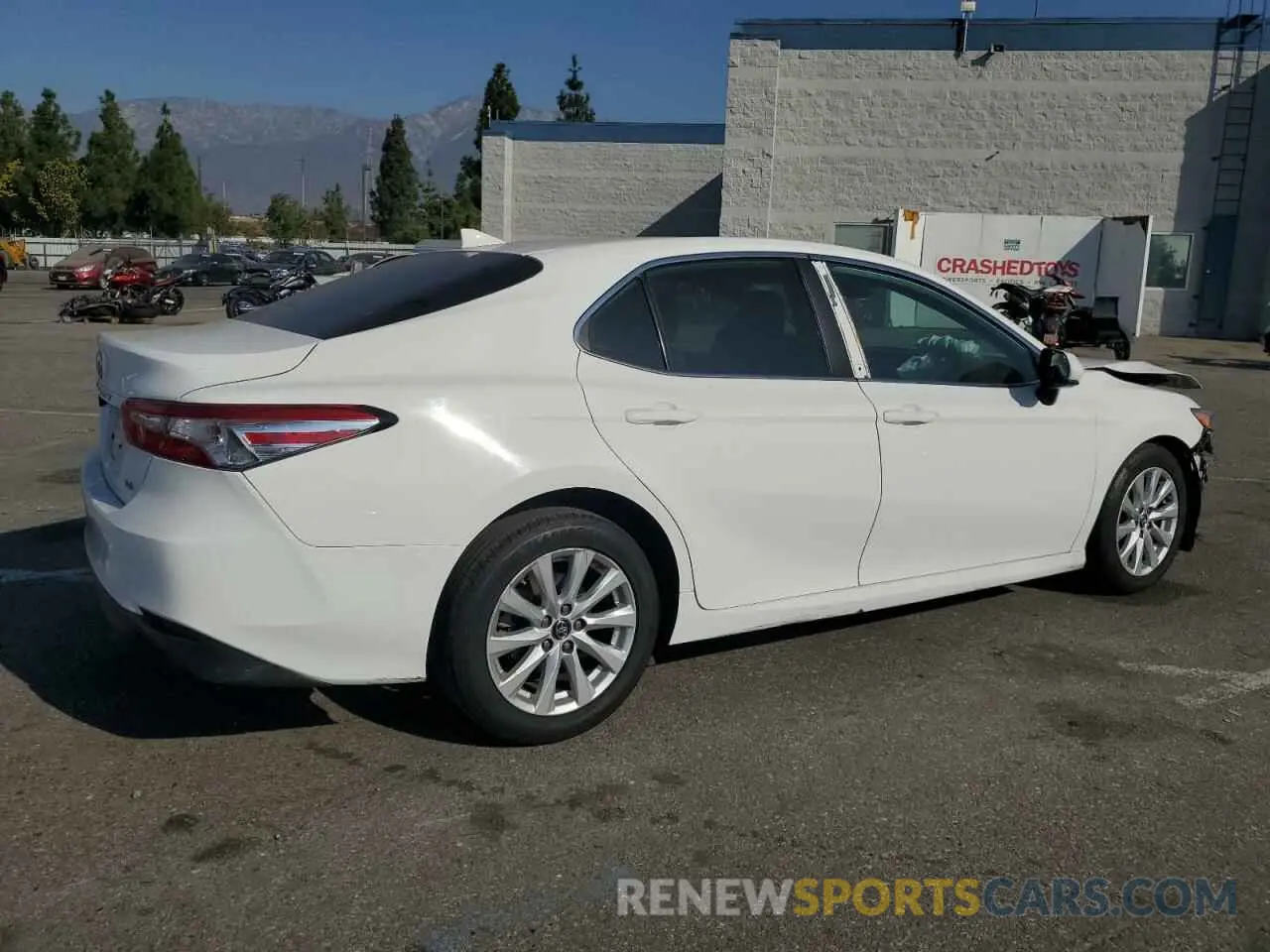 3 Photograph of a damaged car 4T1B11HK4KU721026 TOYOTA CAMRY 2019