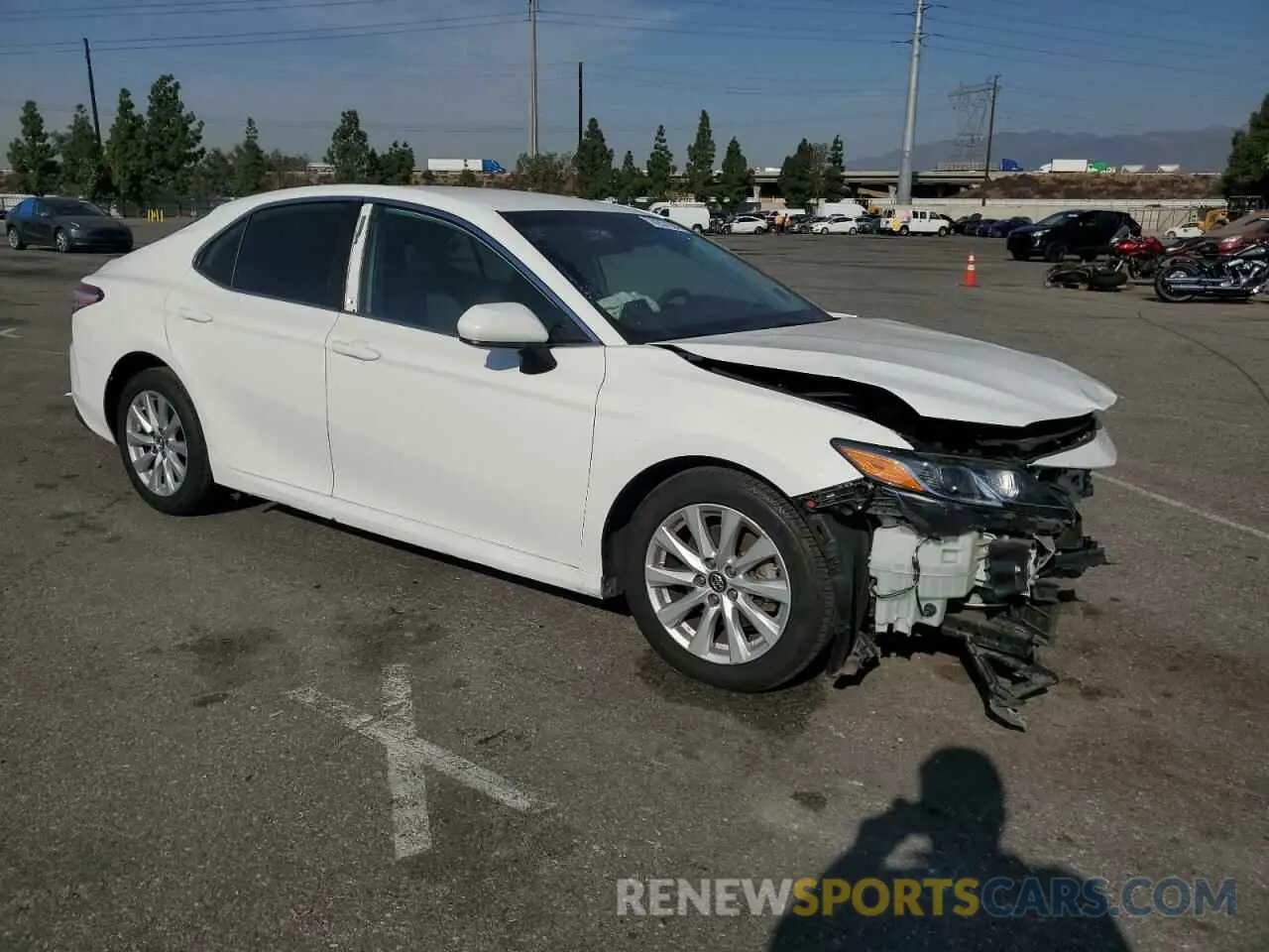 4 Photograph of a damaged car 4T1B11HK4KU721026 TOYOTA CAMRY 2019