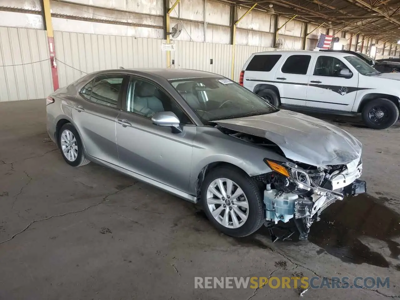 4 Photograph of a damaged car 4T1B11HK4KU723813 TOYOTA CAMRY 2019