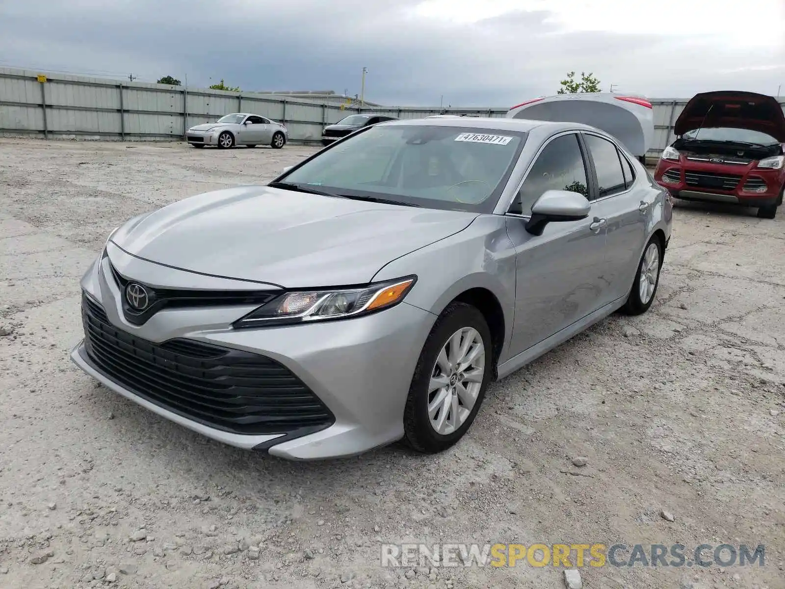 2 Photograph of a damaged car 4T1B11HK4KU723827 TOYOTA CAMRY 2019