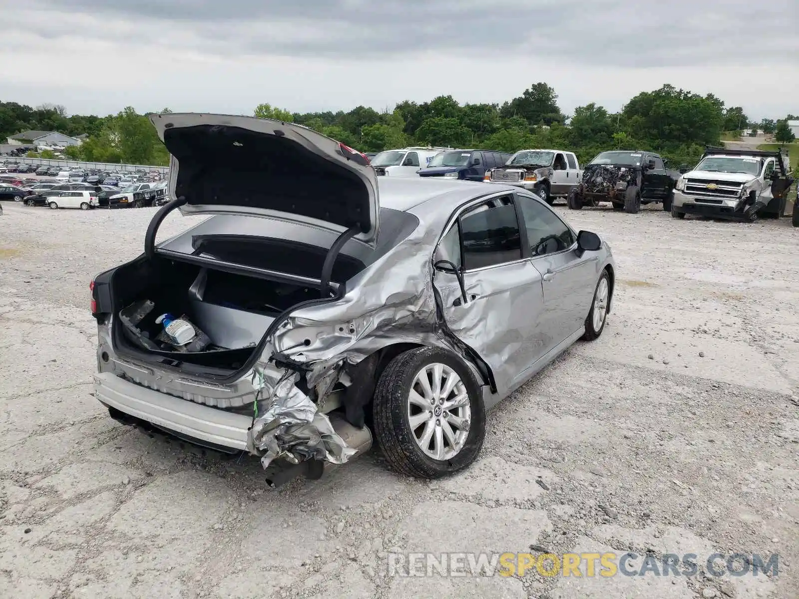 4 Photograph of a damaged car 4T1B11HK4KU723827 TOYOTA CAMRY 2019