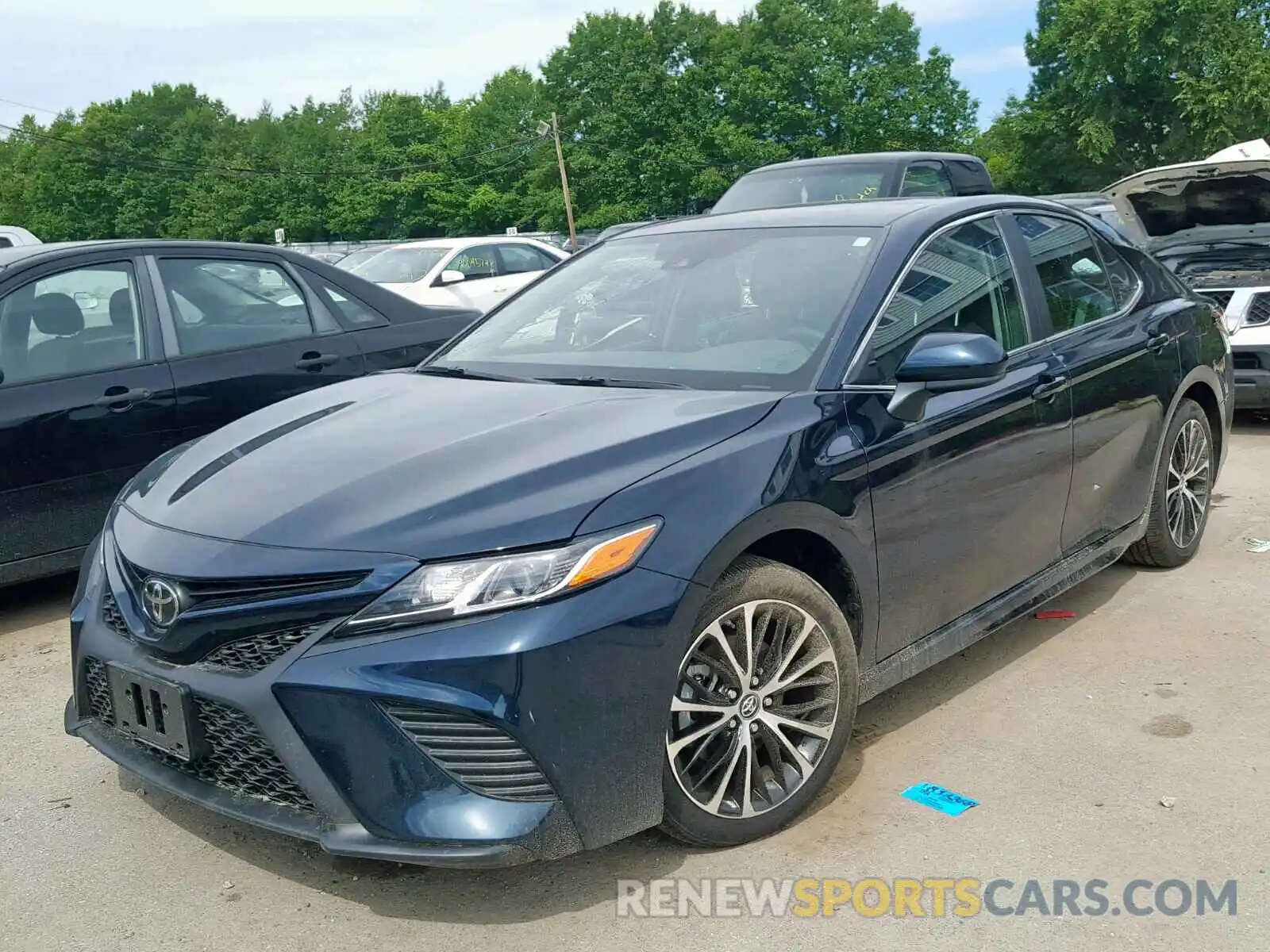 2 Photograph of a damaged car 4T1B11HK4KU725884 TOYOTA CAMRY 2019