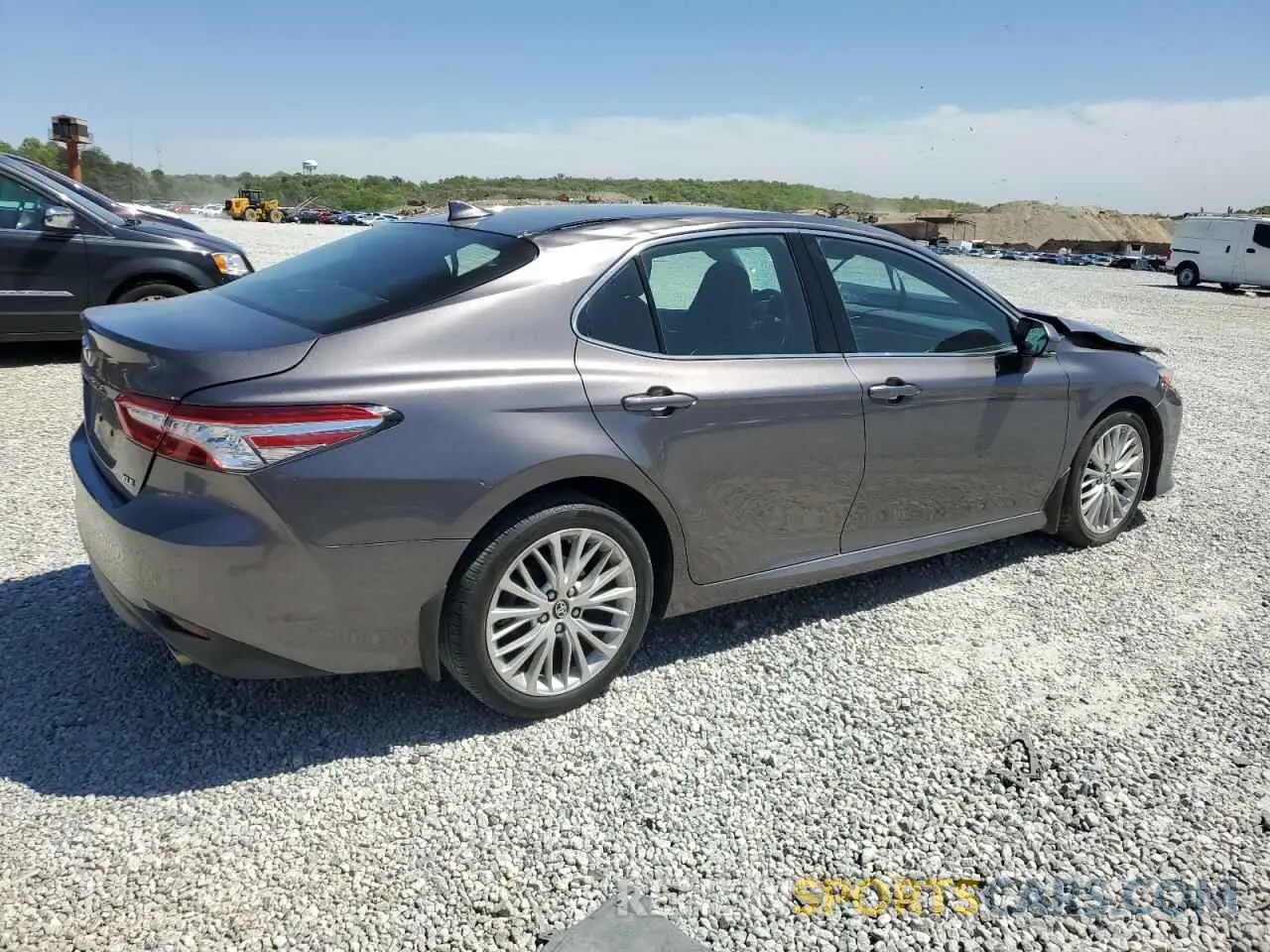 3 Photograph of a damaged car 4T1B11HK4KU725979 TOYOTA CAMRY 2019