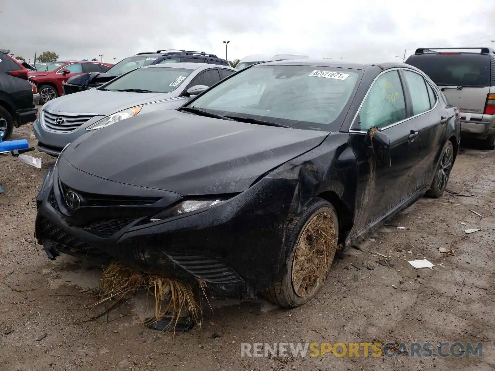 2 Photograph of a damaged car 4T1B11HK4KU731121 TOYOTA CAMRY 2019