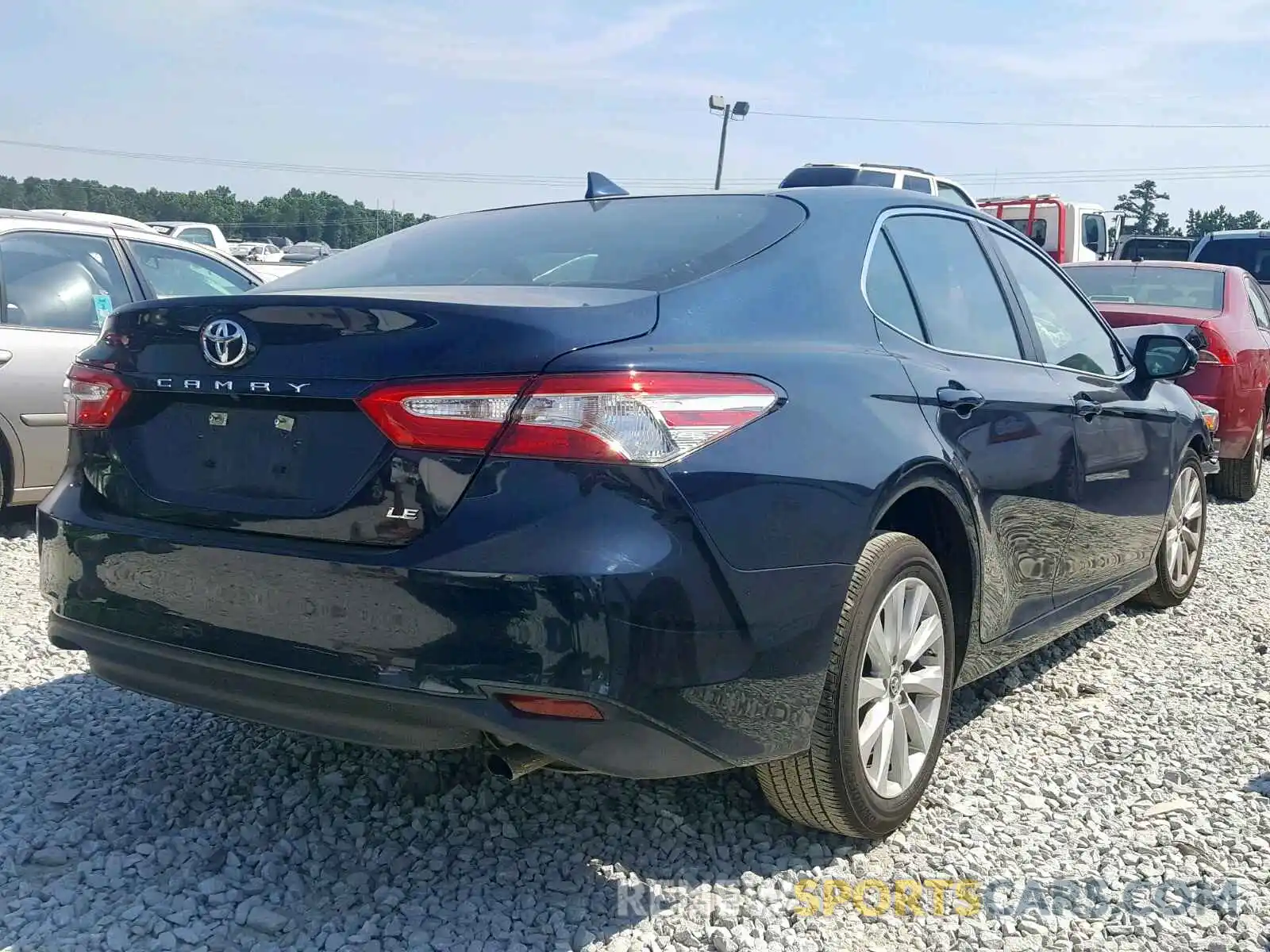 4 Photograph of a damaged car 4T1B11HK4KU731989 TOYOTA CAMRY 2019