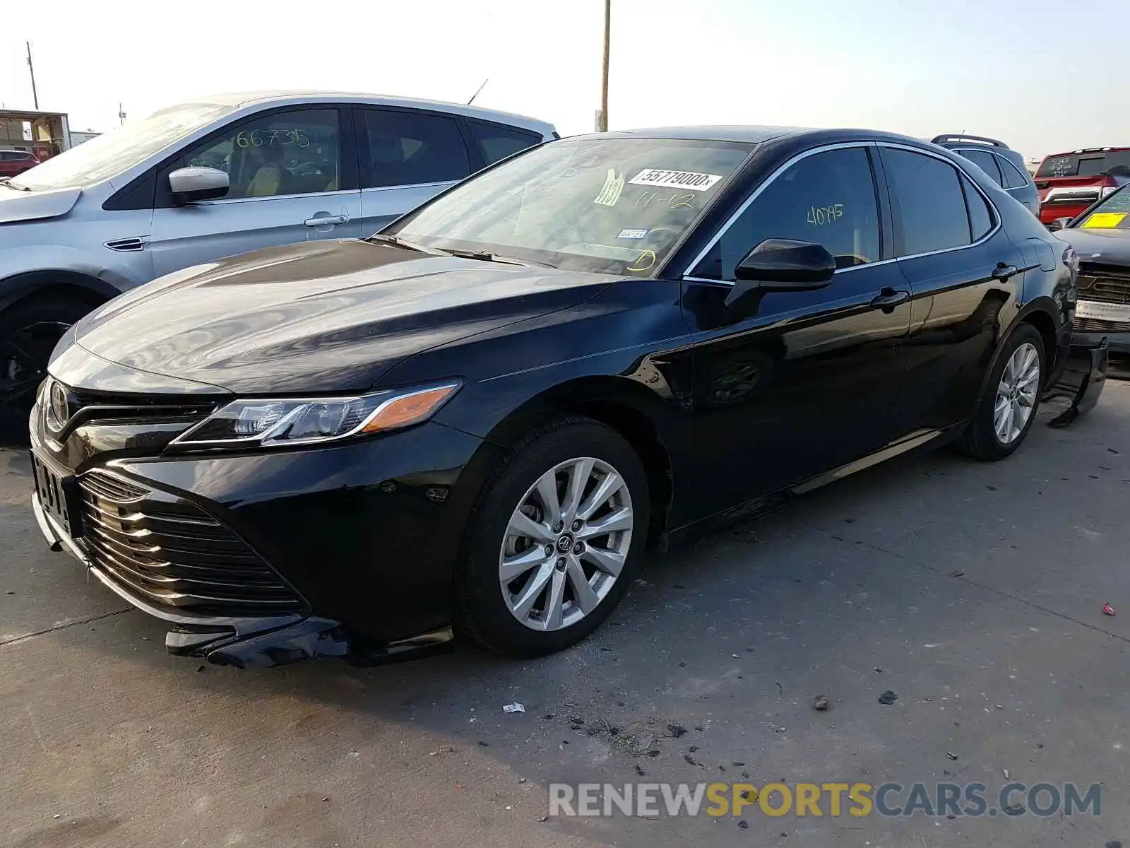 2 Photograph of a damaged car 4T1B11HK4KU733256 TOYOTA CAMRY 2019