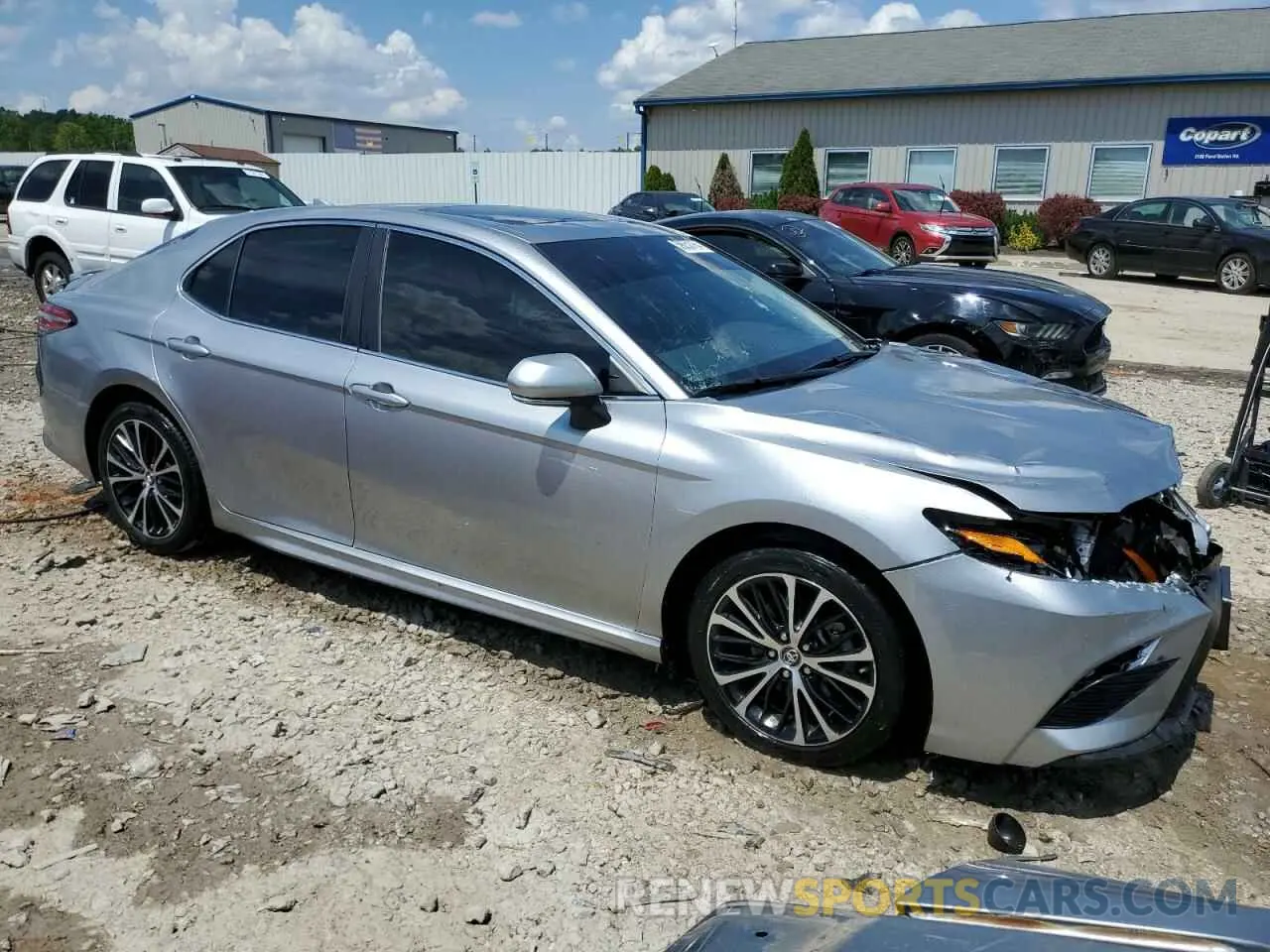 4 Photograph of a damaged car 4T1B11HK4KU734326 TOYOTA CAMRY 2019