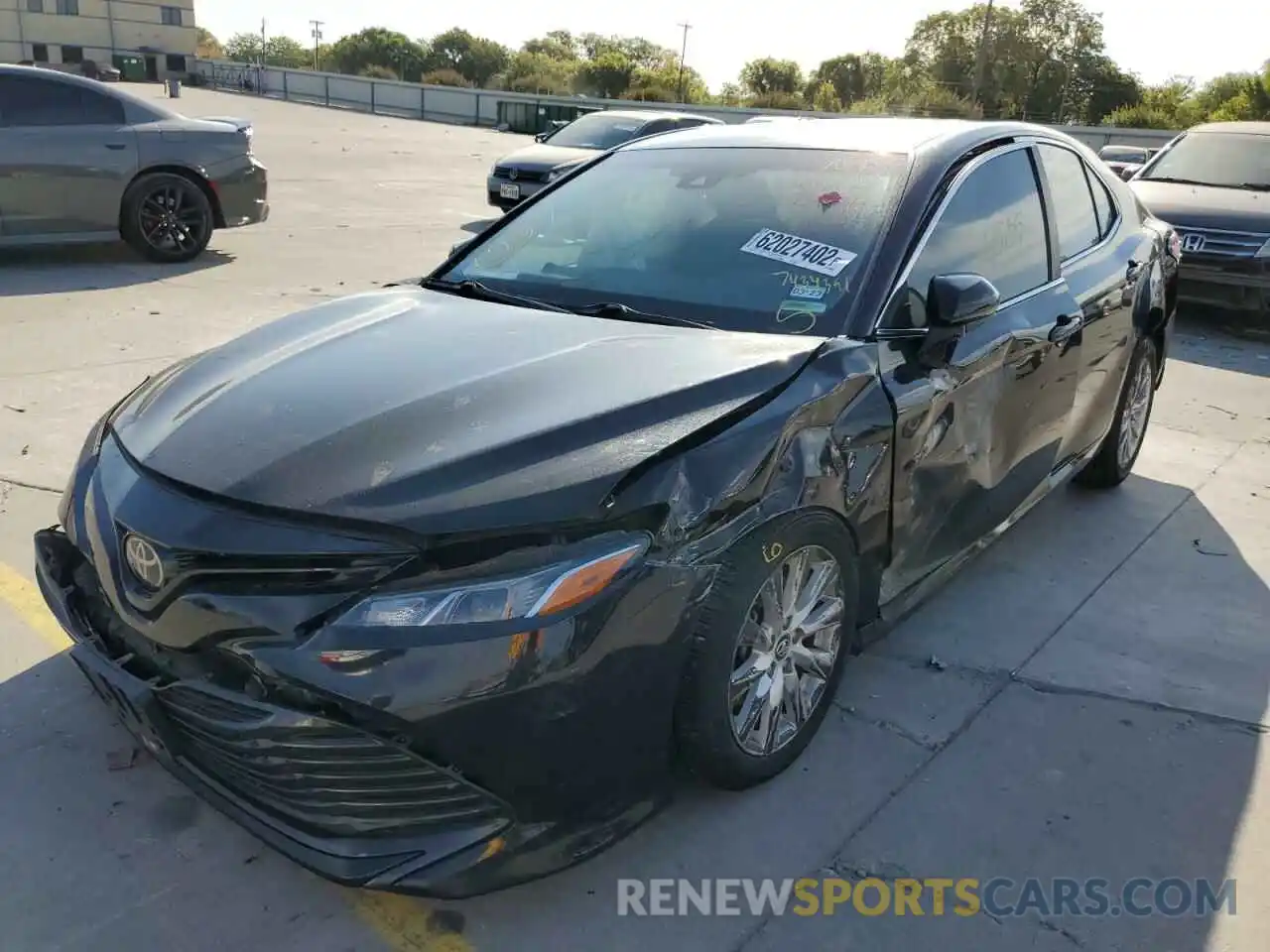 2 Photograph of a damaged car 4T1B11HK4KU734391 TOYOTA CAMRY 2019