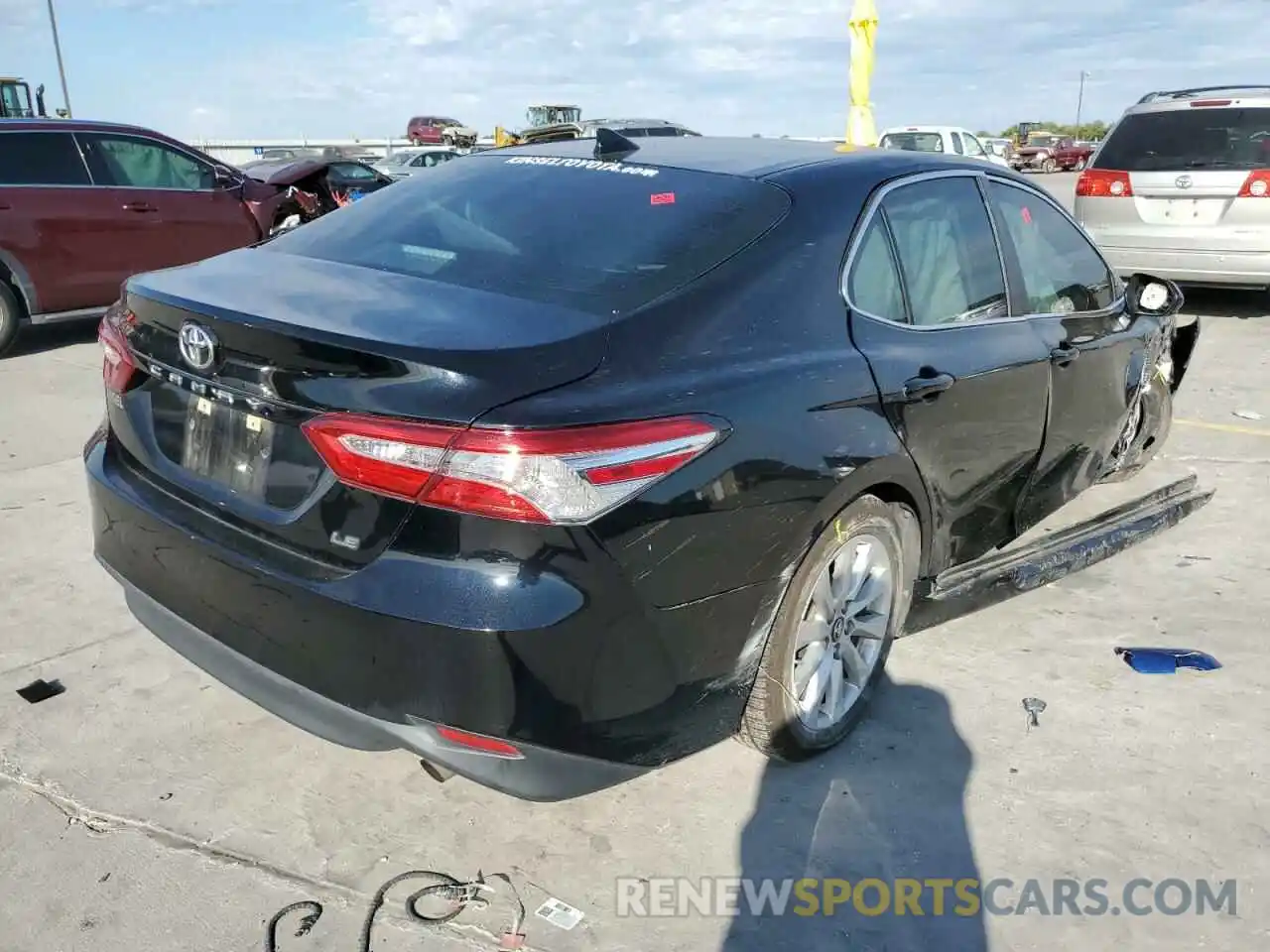 4 Photograph of a damaged car 4T1B11HK4KU734391 TOYOTA CAMRY 2019