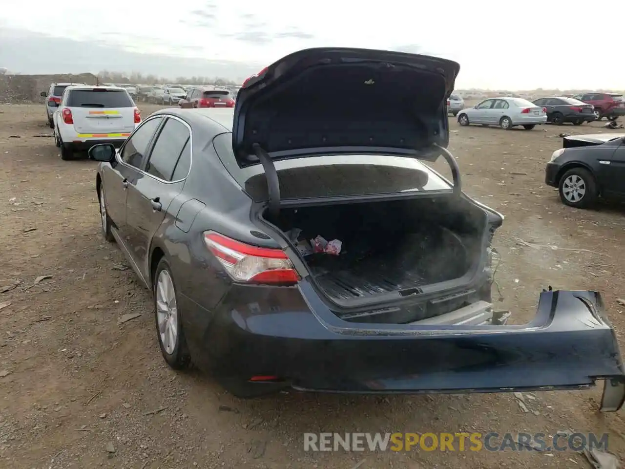 3 Photograph of a damaged car 4T1B11HK4KU738473 TOYOTA CAMRY 2019