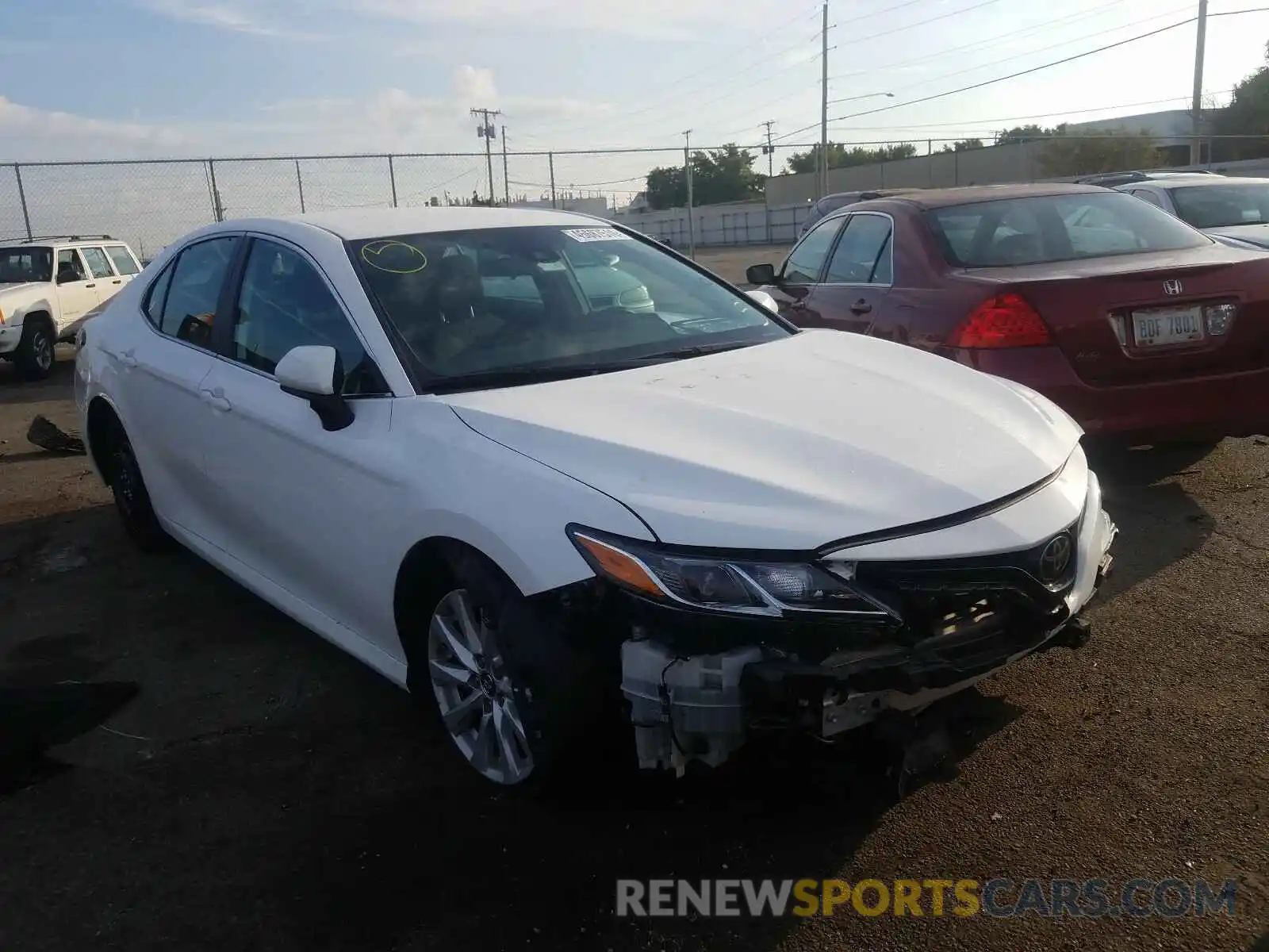 1 Photograph of a damaged car 4T1B11HK4KU741857 TOYOTA CAMRY 2019