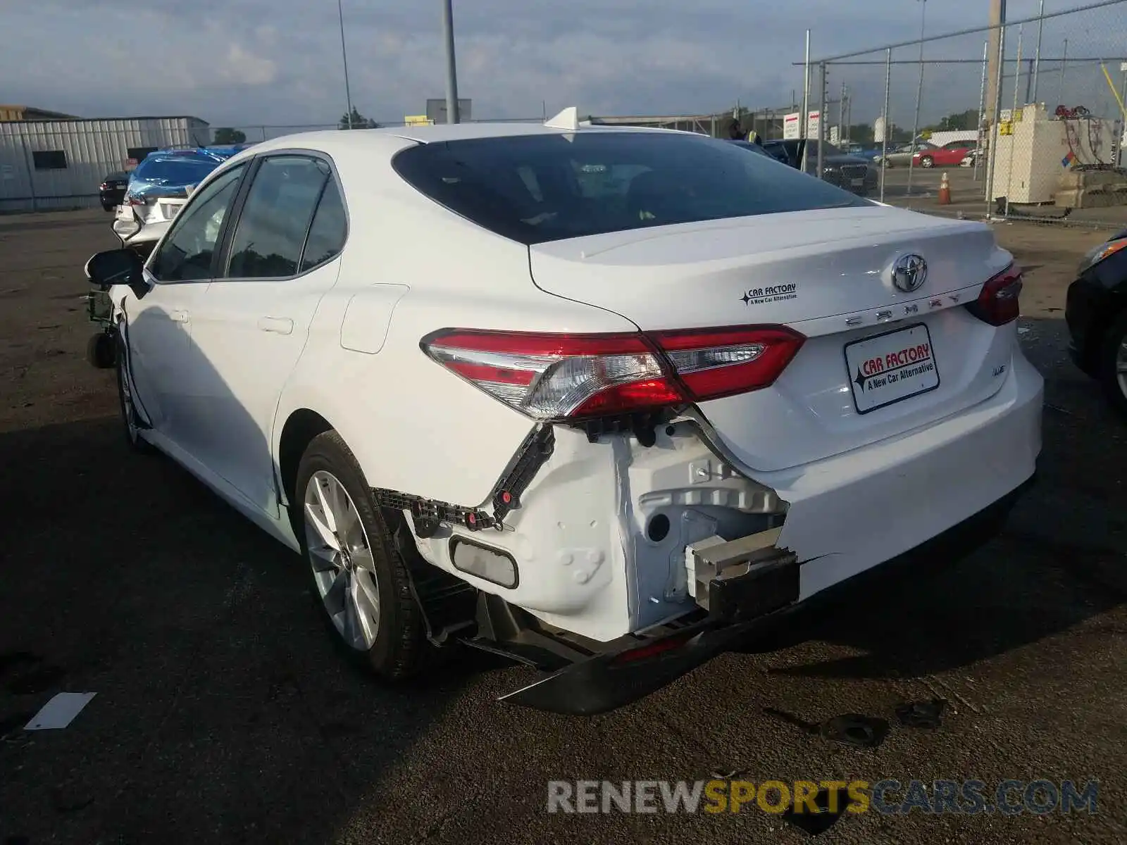 3 Photograph of a damaged car 4T1B11HK4KU741857 TOYOTA CAMRY 2019