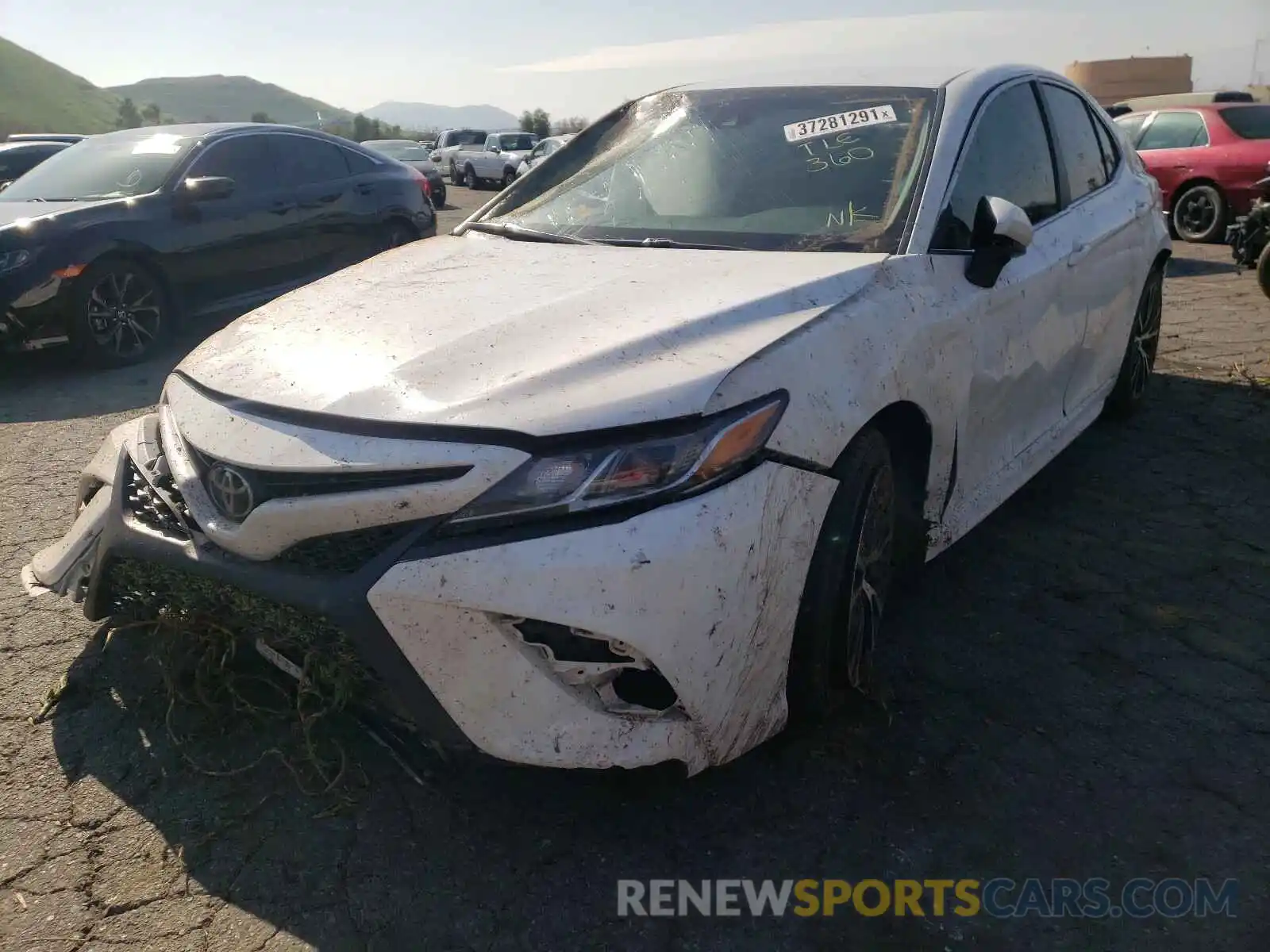 2 Photograph of a damaged car 4T1B11HK4KU742328 TOYOTA CAMRY 2019