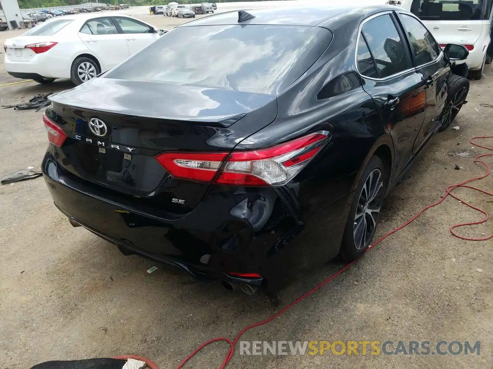 4 Photograph of a damaged car 4T1B11HK4KU746511 TOYOTA CAMRY 2019