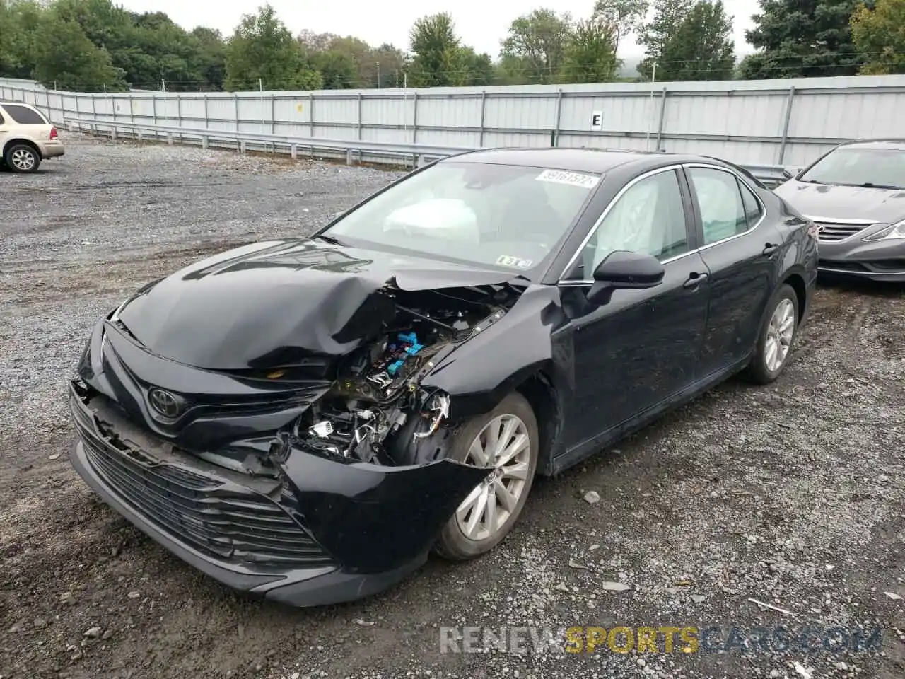 2 Photograph of a damaged car 4T1B11HK4KU746556 TOYOTA CAMRY 2019