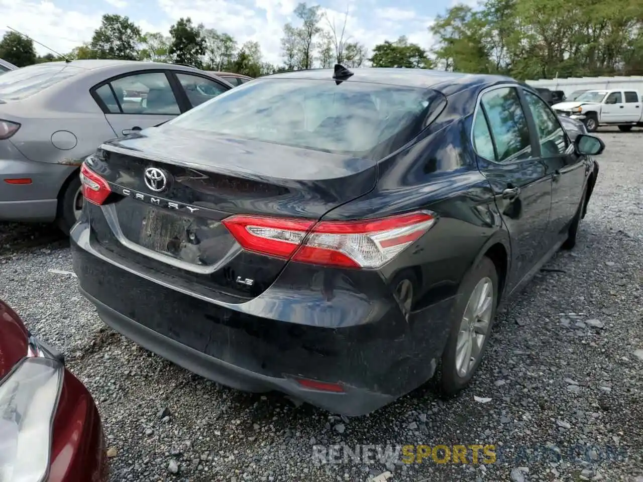 4 Photograph of a damaged car 4T1B11HK4KU746556 TOYOTA CAMRY 2019