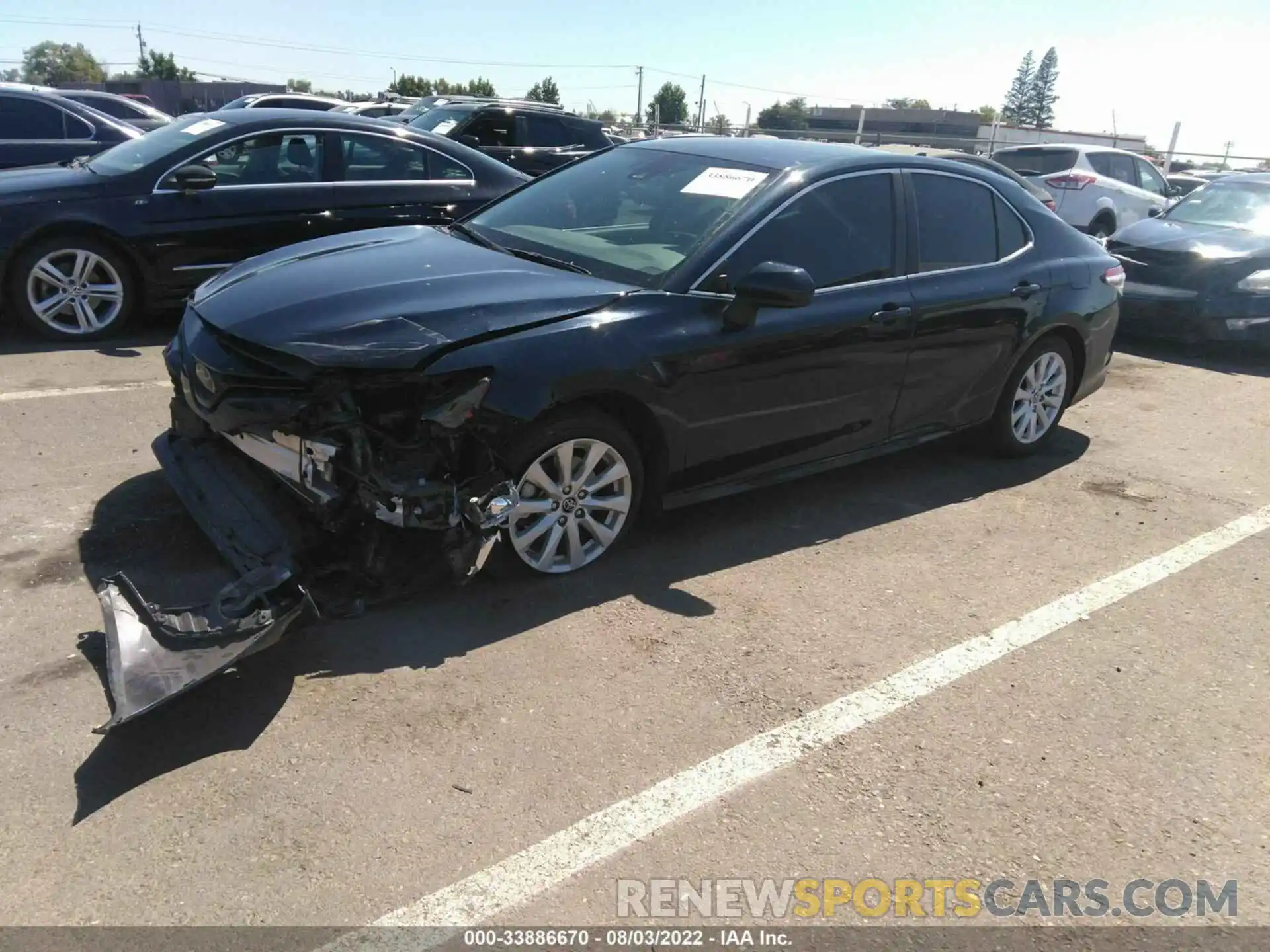 2 Photograph of a damaged car 4T1B11HK4KU746797 TOYOTA CAMRY 2019