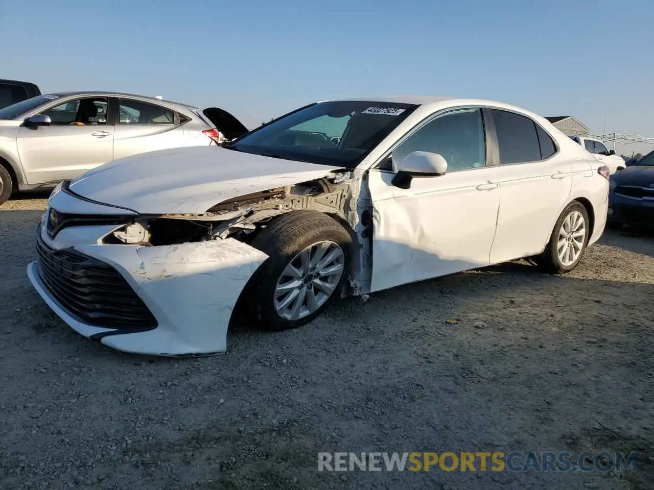 1 Photograph of a damaged car 4T1B11HK4KU751613 TOYOTA CAMRY 2019