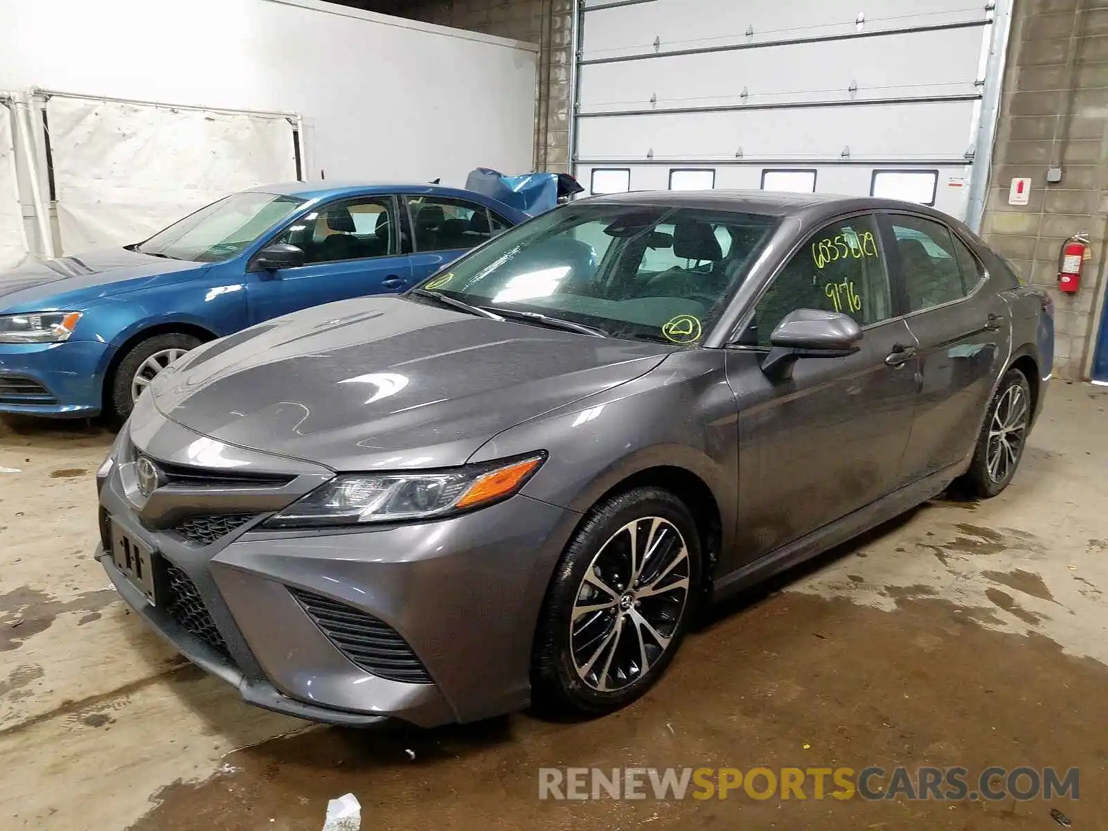 2 Photograph of a damaged car 4T1B11HK4KU752597 TOYOTA CAMRY 2019