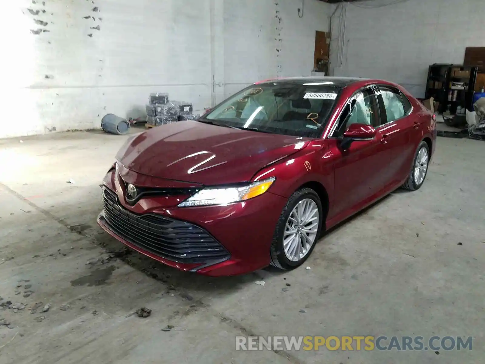 2 Photograph of a damaged car 4T1B11HK4KU754690 TOYOTA CAMRY 2019