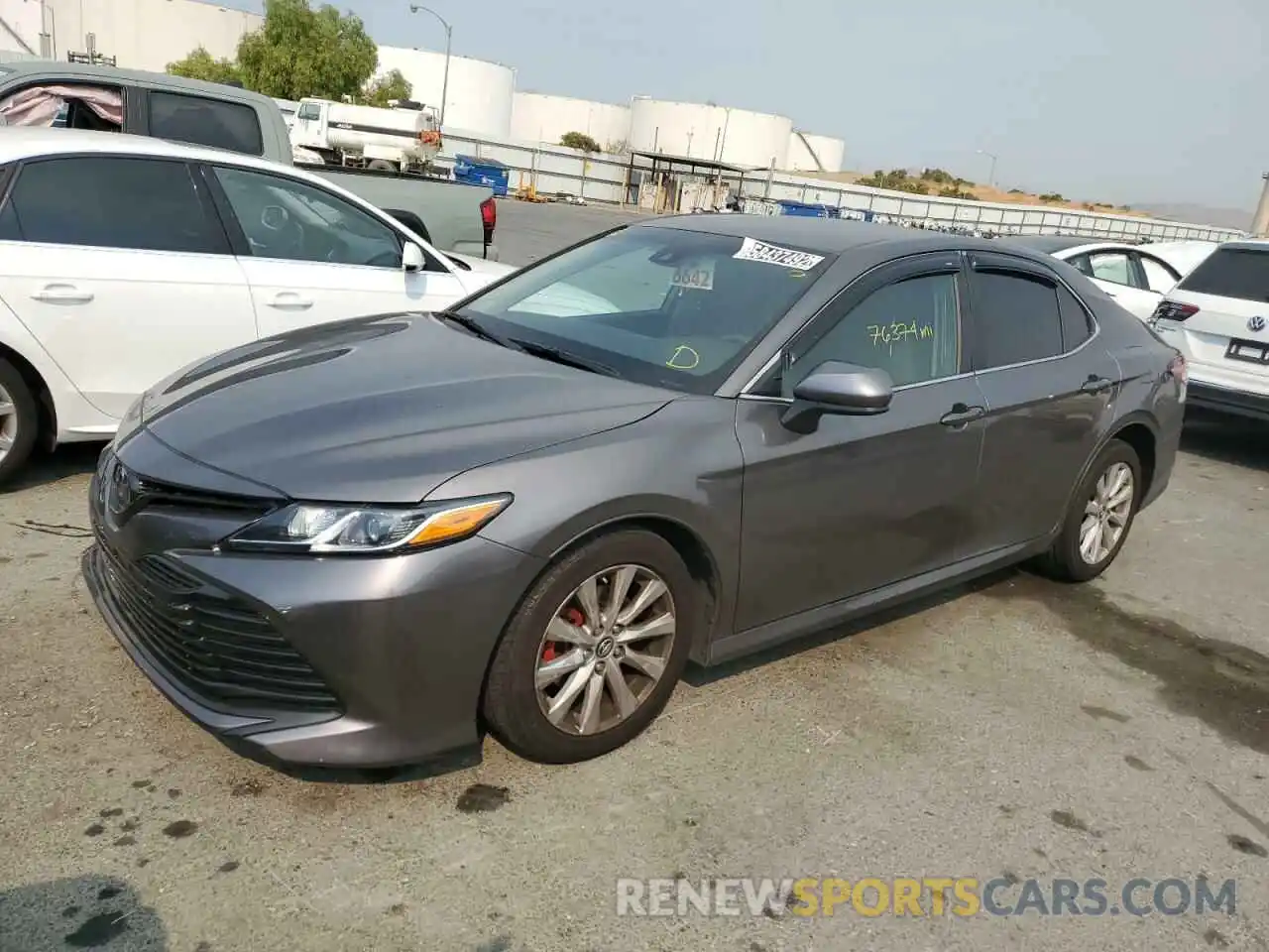 2 Photograph of a damaged car 4T1B11HK4KU759002 TOYOTA CAMRY 2019